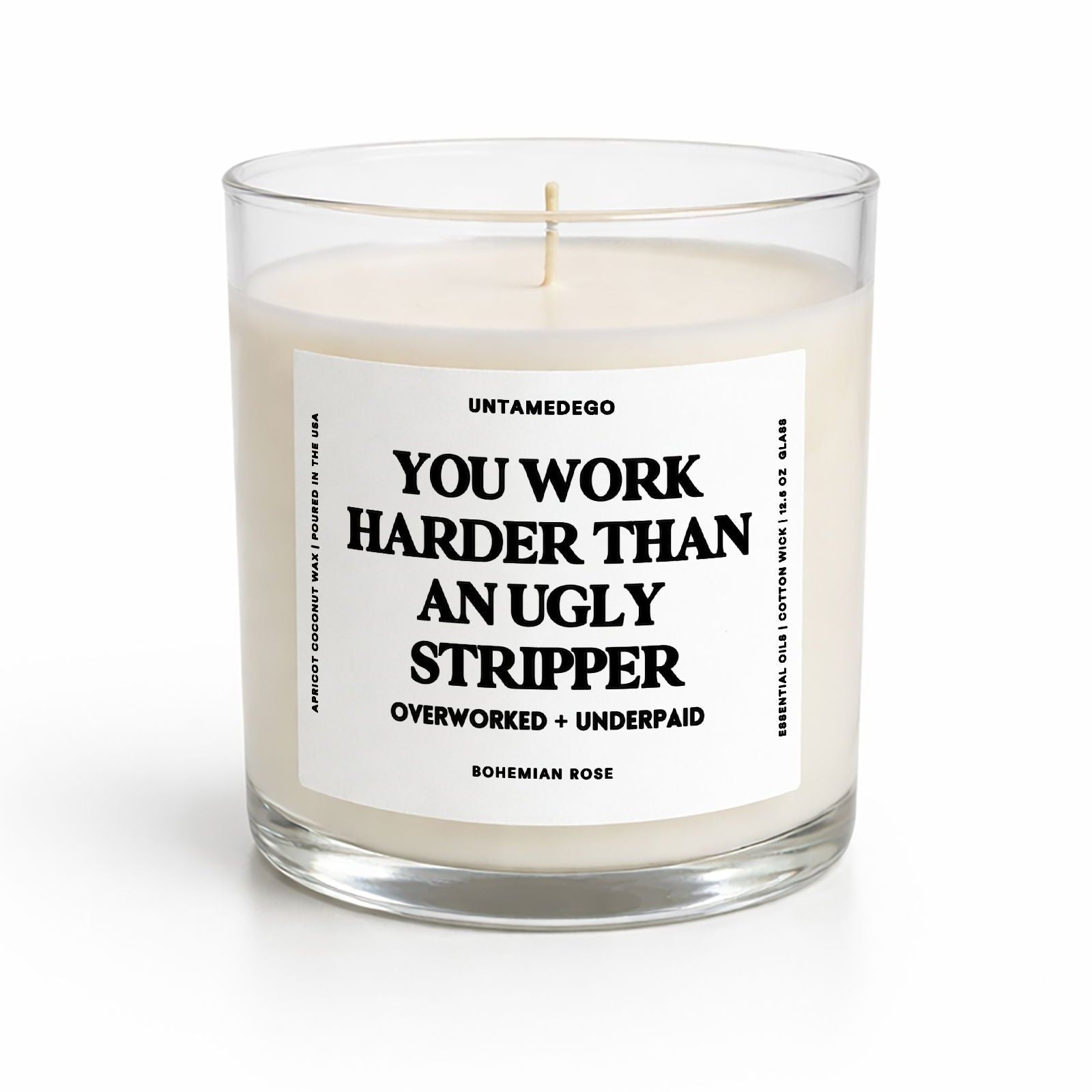 Candle in a glass jar with a label on a white background