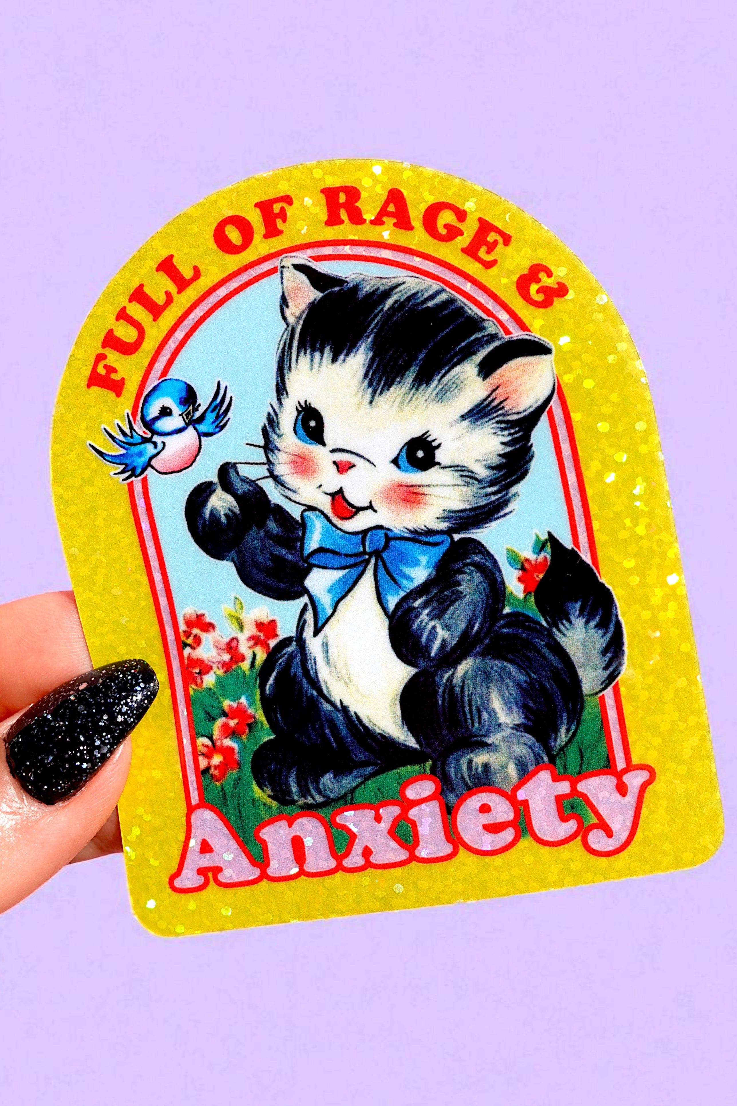 Sticker with a cat and bird design labeled 'Full of Rage & Anxiety' on a purple background.