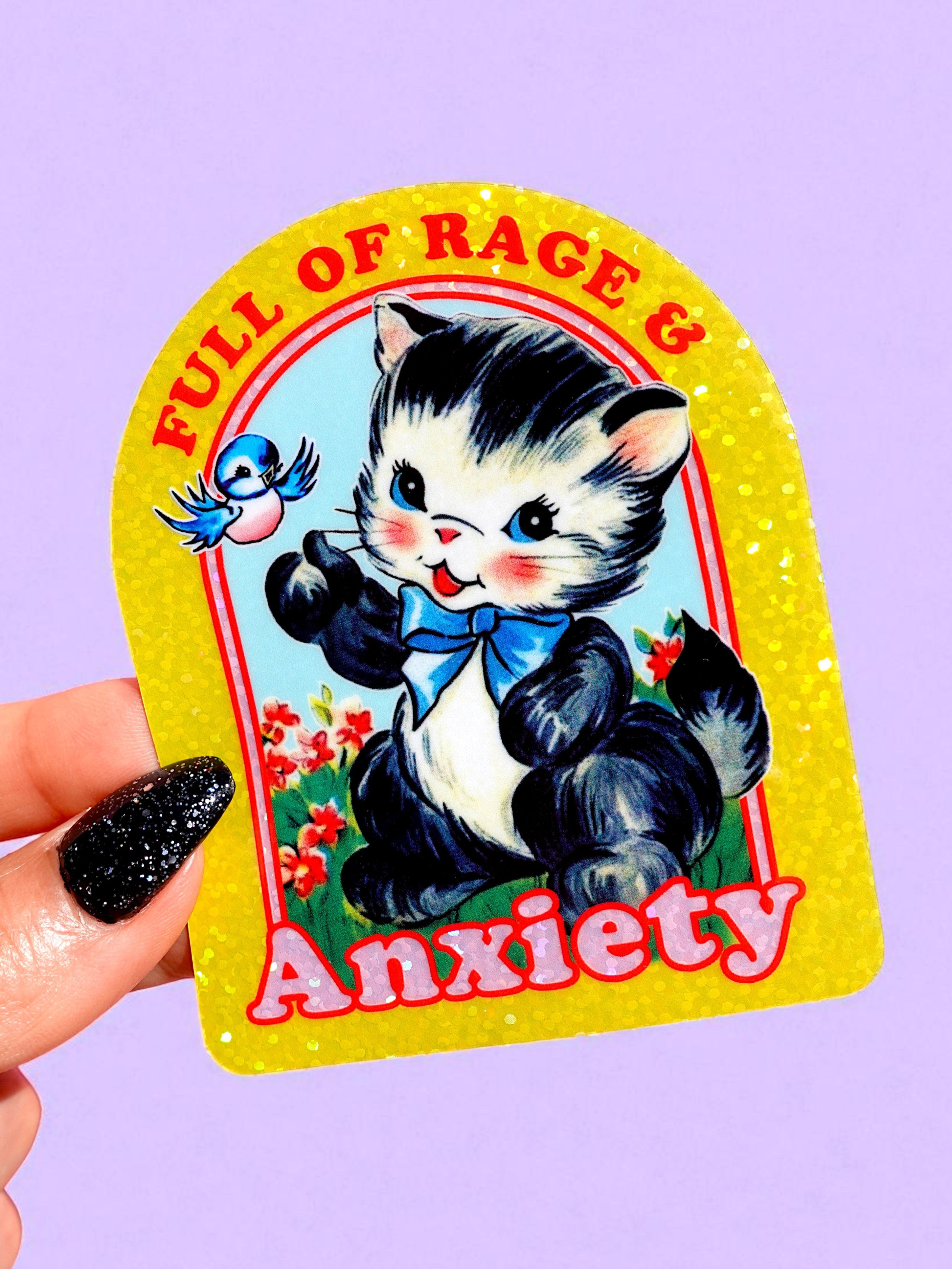 Sticker with a cat and bird design labeled 'Full of Rage & Anxiety' on a purple background.