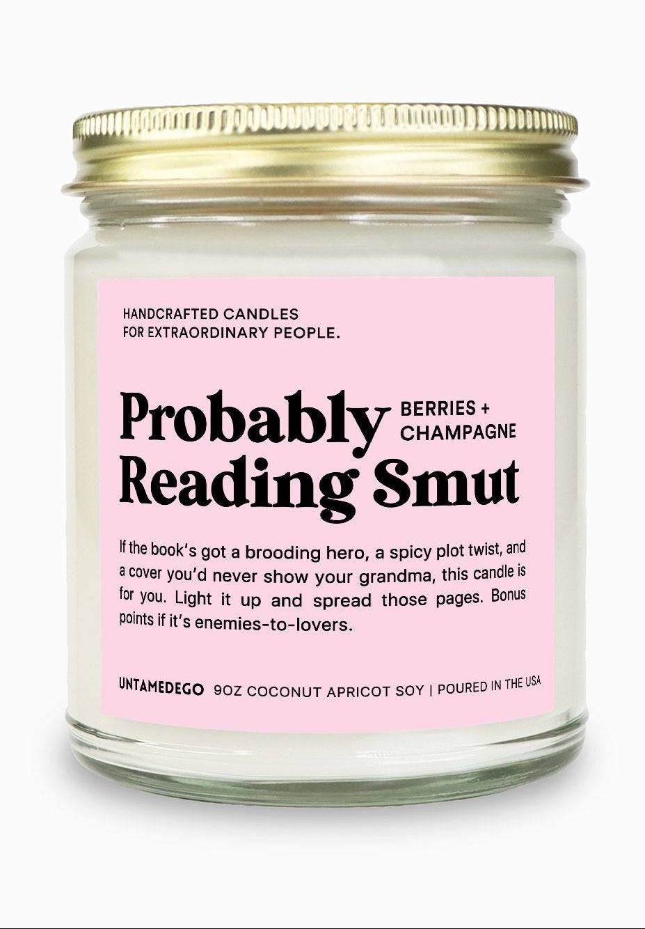 Candle with a pink label on a white background