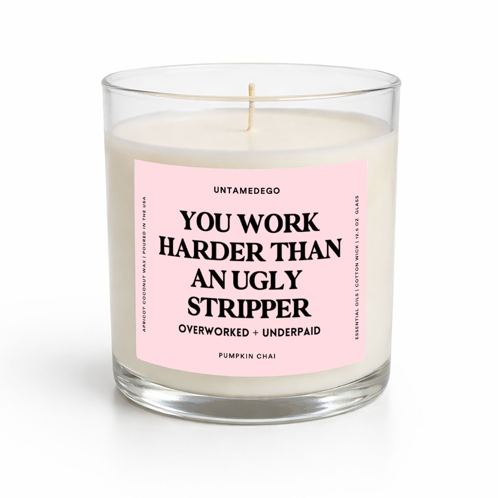 Candle with a pink label on a white background