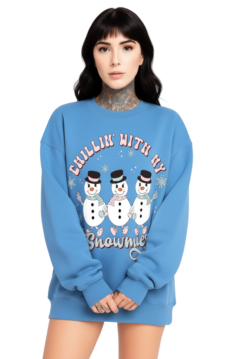Person wearing a blue sweatshirt with snowmen graphics and text on a white background