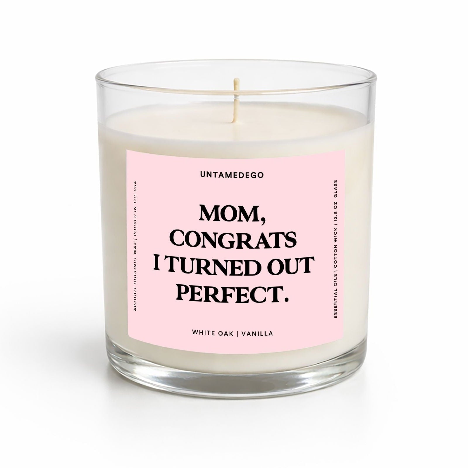 Candle with a pink label on a white background