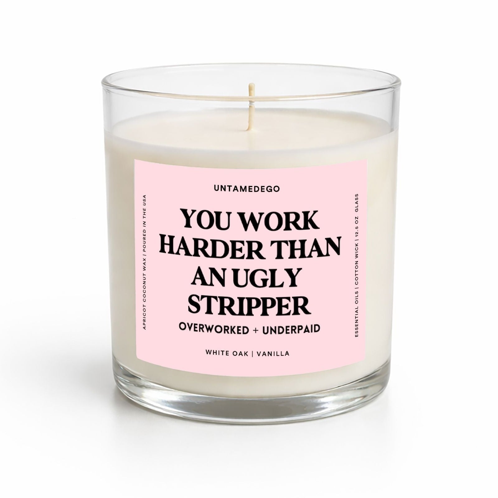 Candle with a pink label on a white background