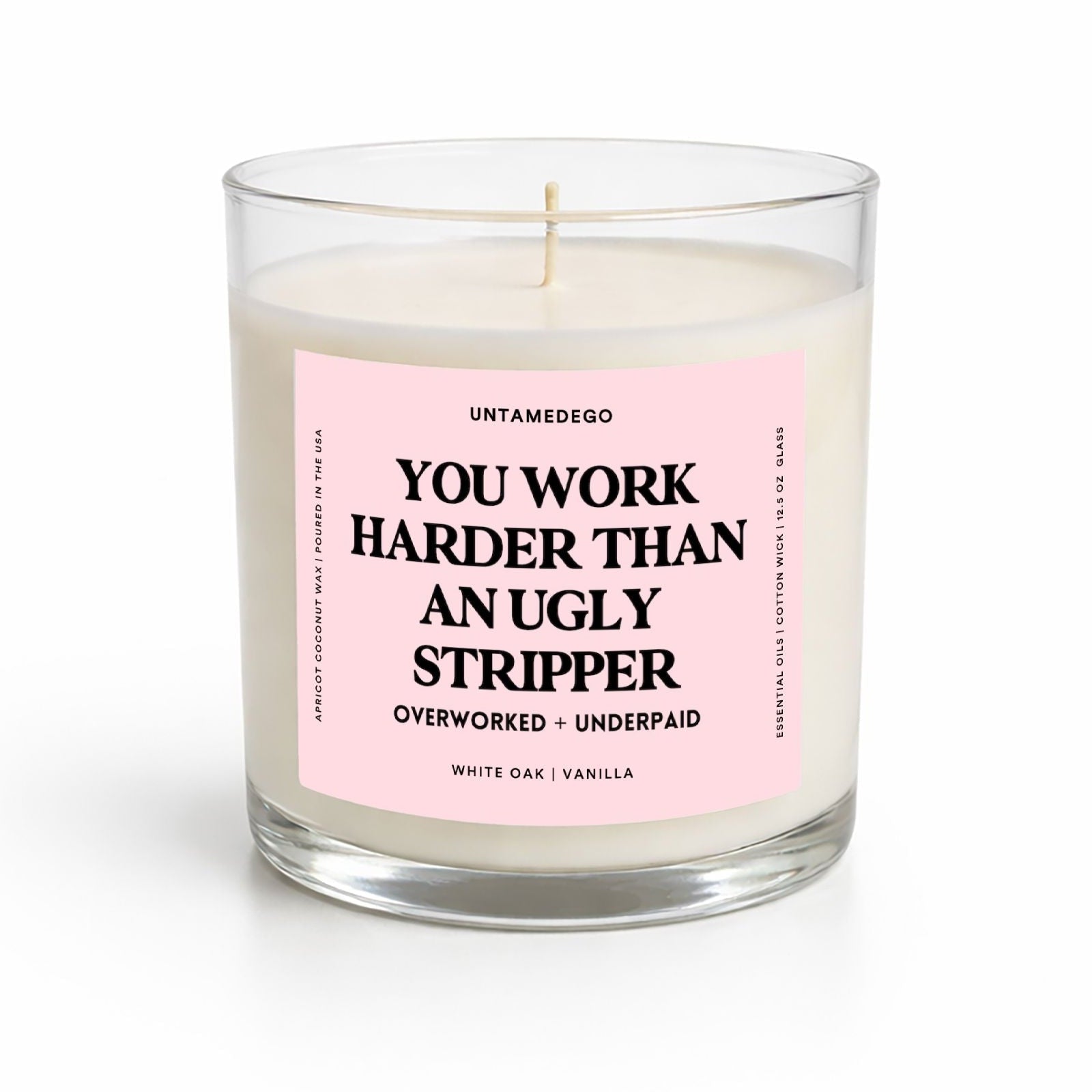 Candle with a pink label on a white background