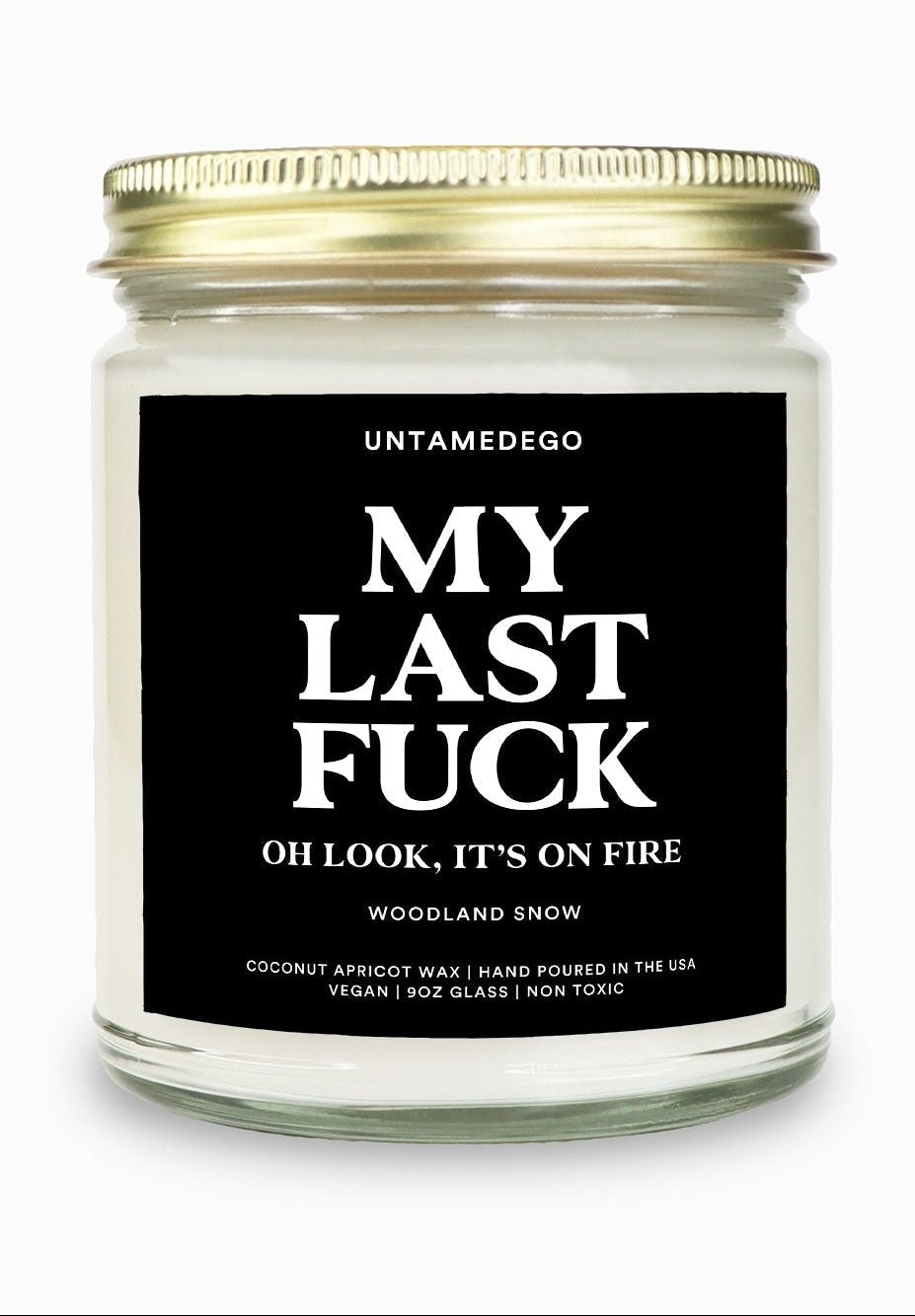 Candle with a black label on a white background