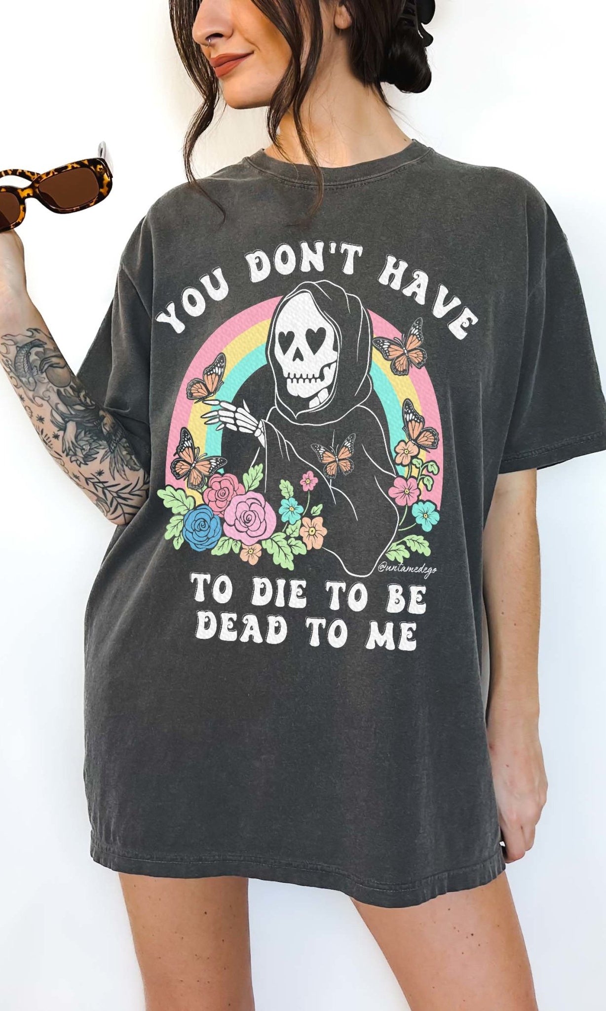 Funny dark humor graphic t-shirt with skeleton and text “you don’t have to die to be dead to me”