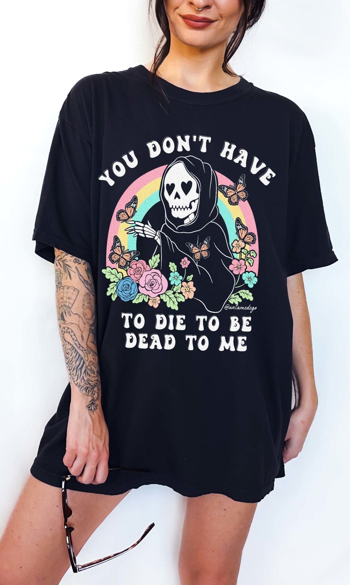 Funny dark humor graphic t-shirt with skeleton and text “you don’t have to die to be dead to me”