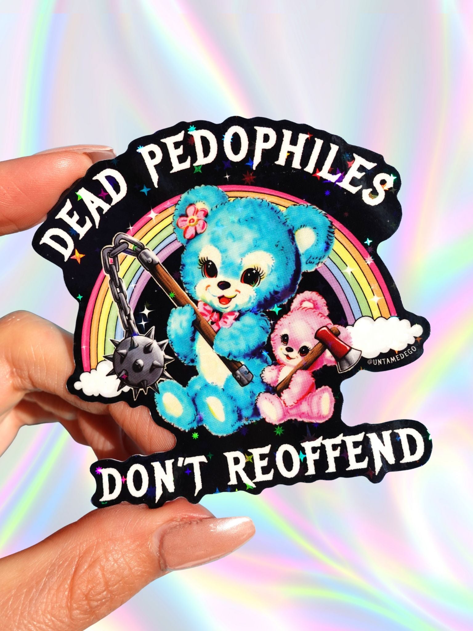 Sticker with cartoon bears, rainbow, and text on a colorful background
