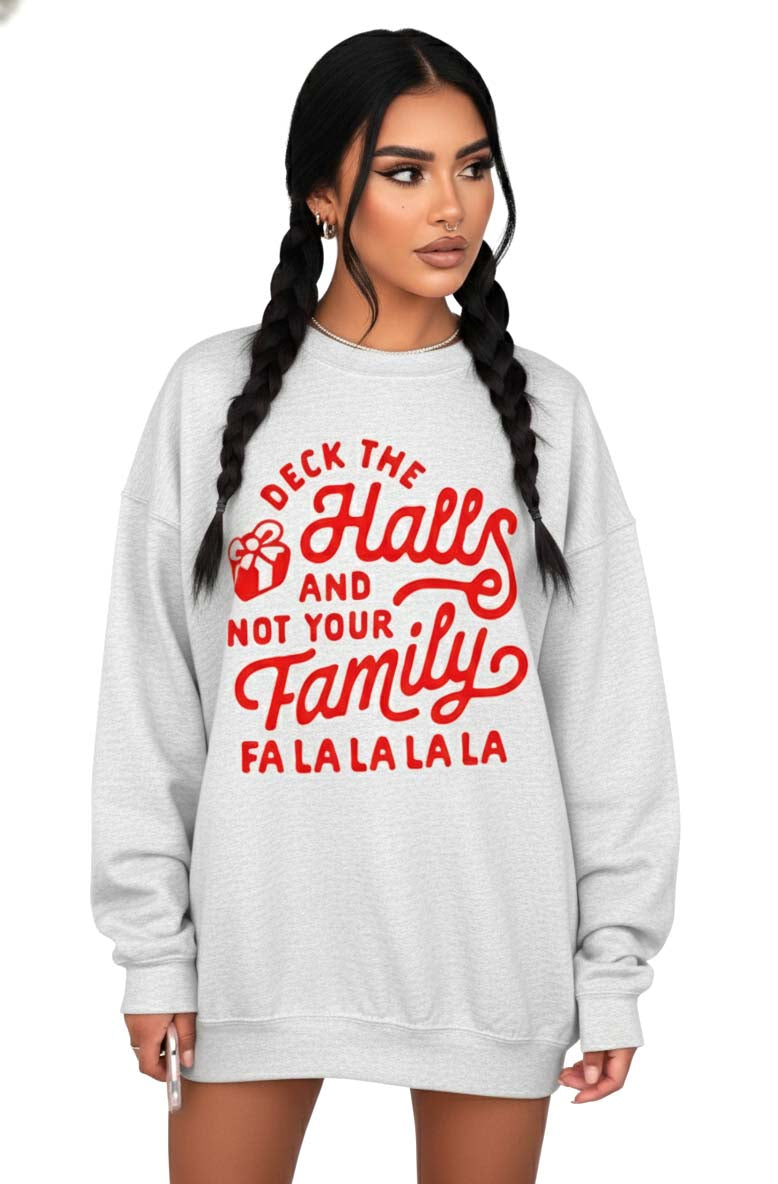 Woman wearing a gray sweatshirt with red text on a white background