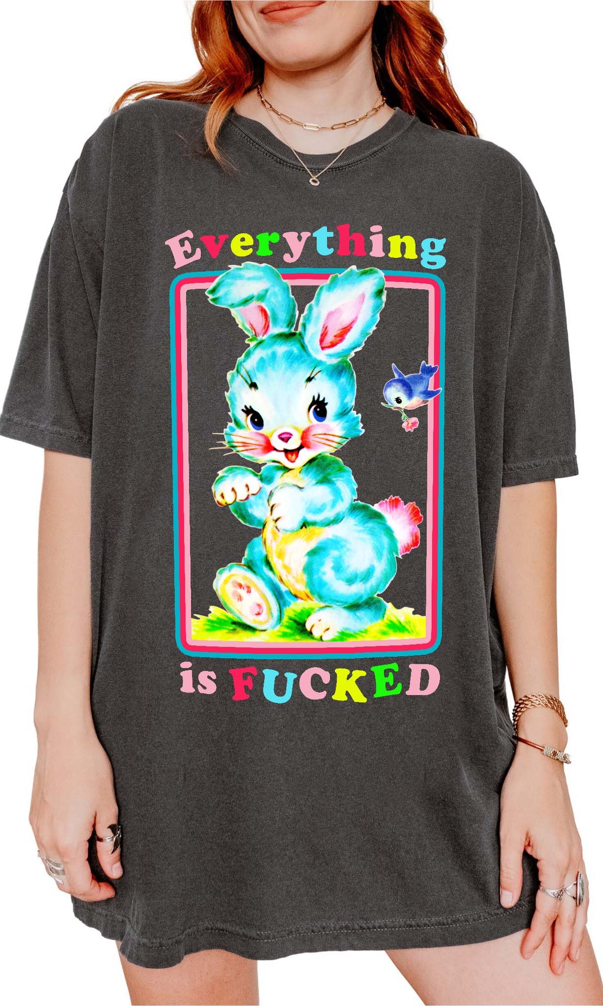 Funny graphic t-shirt with cute bunny illustration and text saying everything is fucked