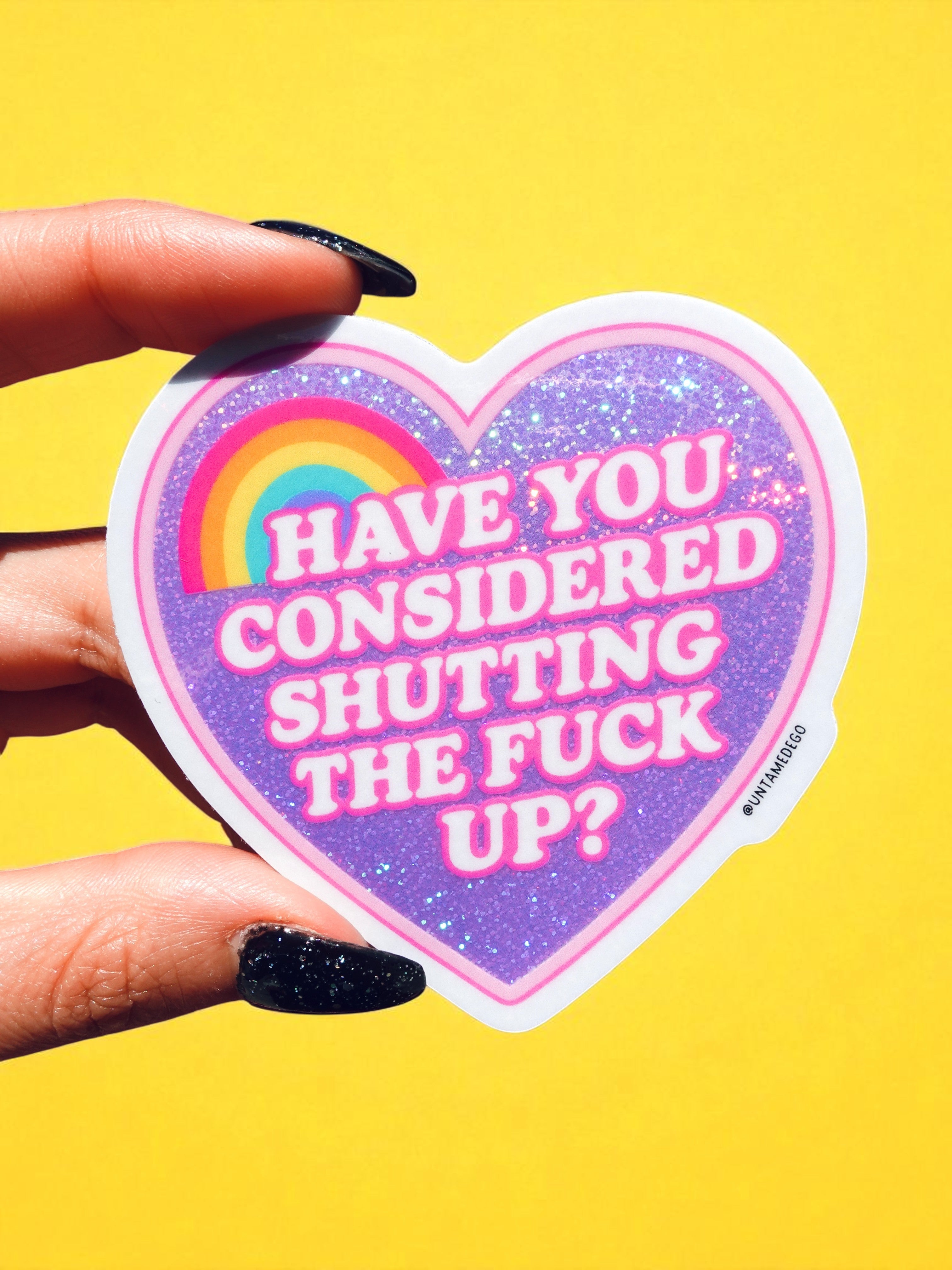 Heart shaped holographic vinyl sticker with bold sarcastic text and colorful rainbow design