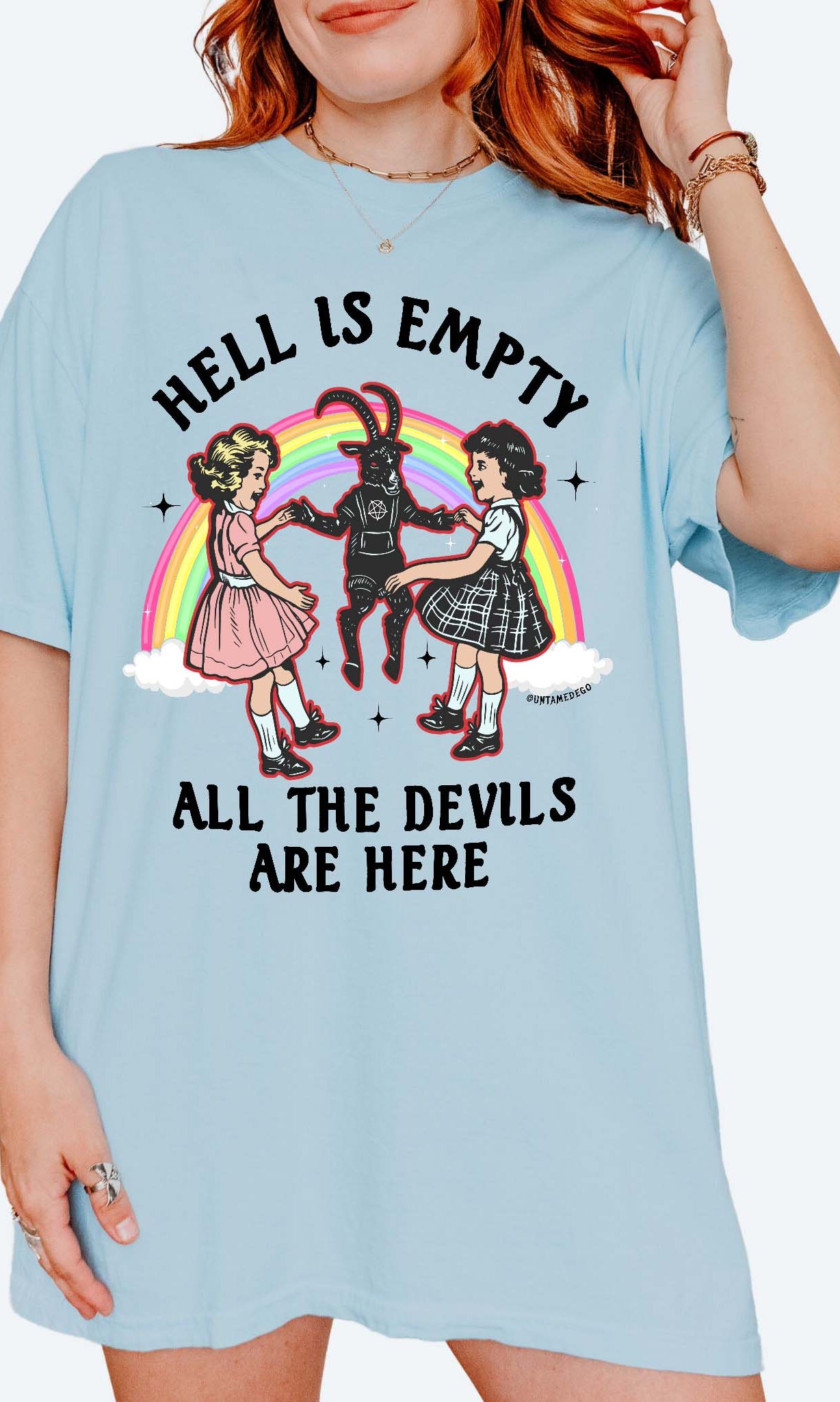 Light blue t-shirt with graphic design and text worn by a person