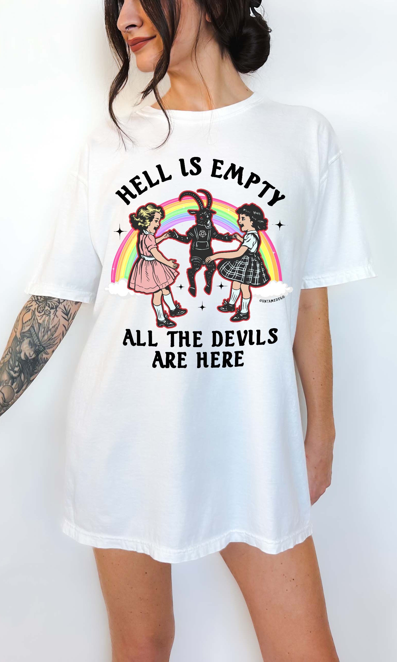 White t-shirt with graphic design and text worn by a person on a white background