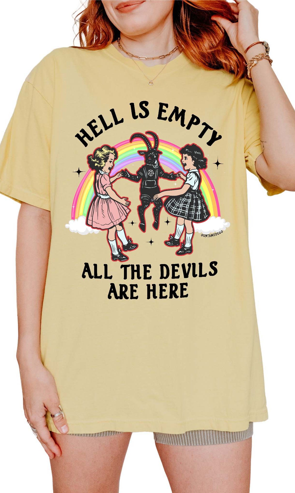 Person wearing a yellow t-shirt with a graphic design and text.