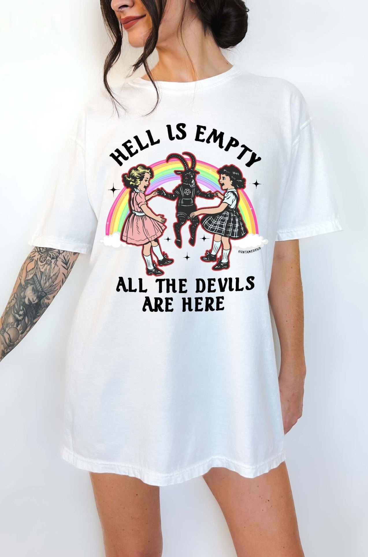 Dark humor graphic t-shirt with devil figure and text saying hell is empty all the devils are here