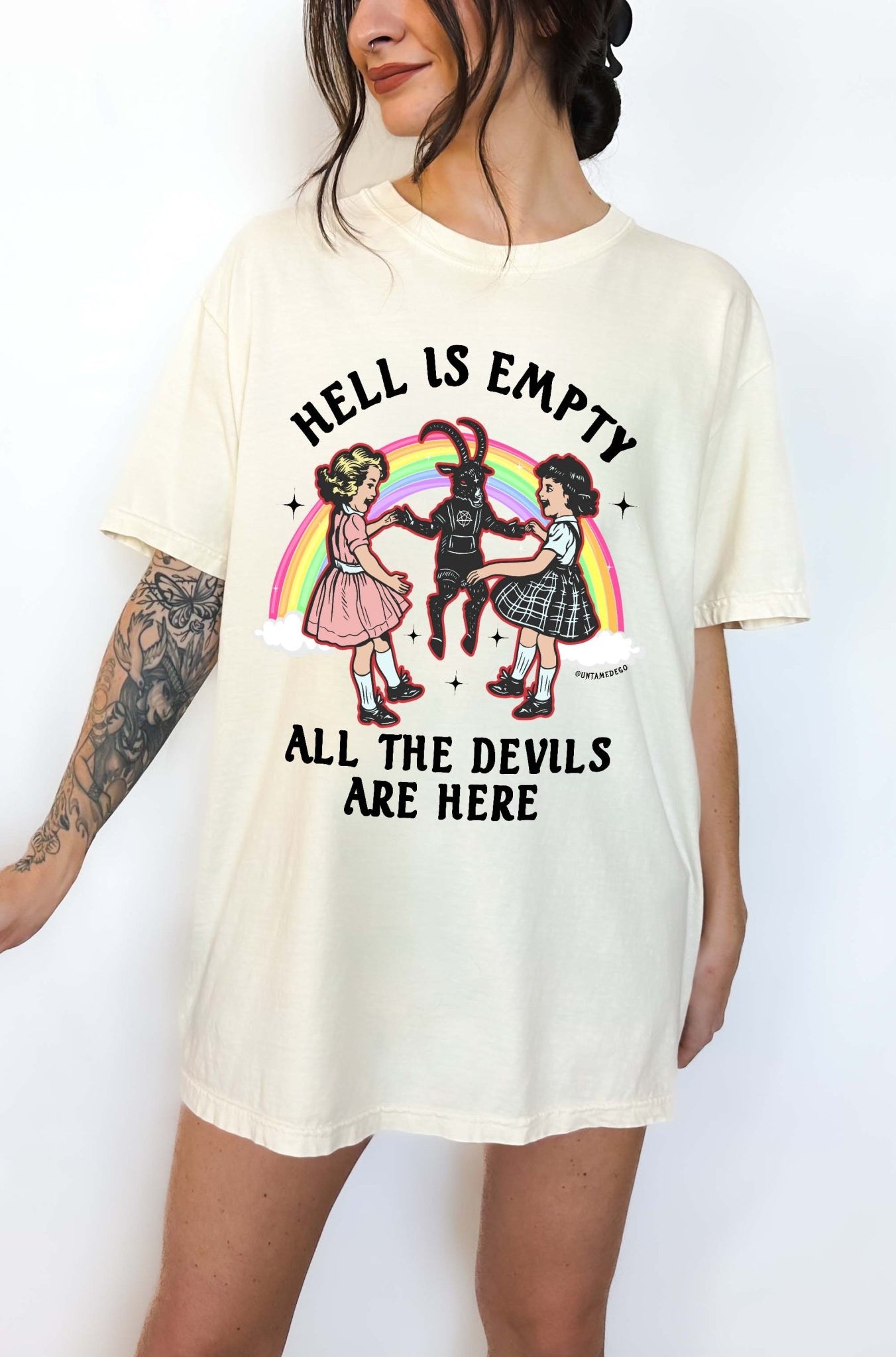 Dark humor graphic t-shirt with devil figure and text saying hell is empty all the devils are here