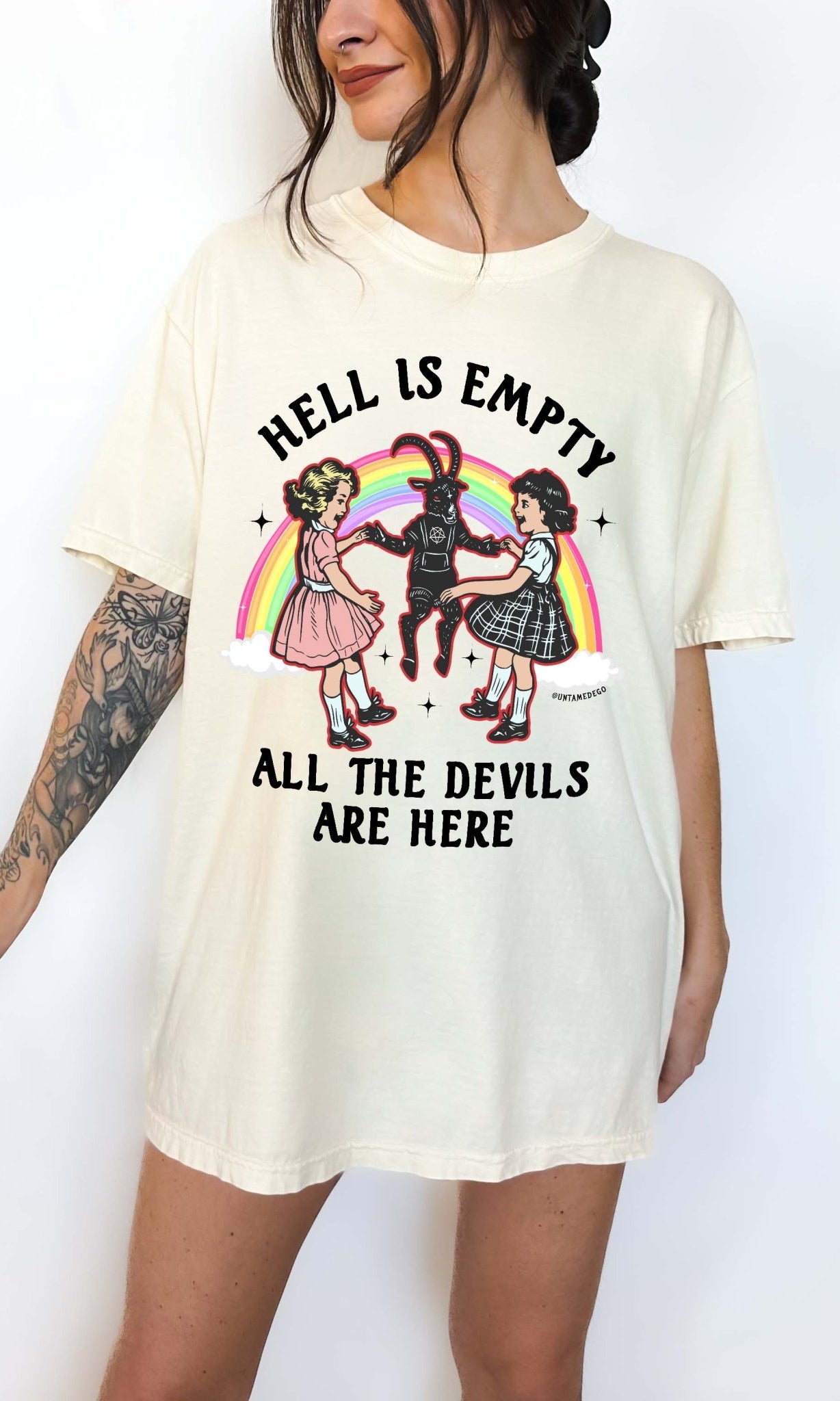 Dark humor graphic t-shirt with devil figure and text saying hell is empty all the devils are here