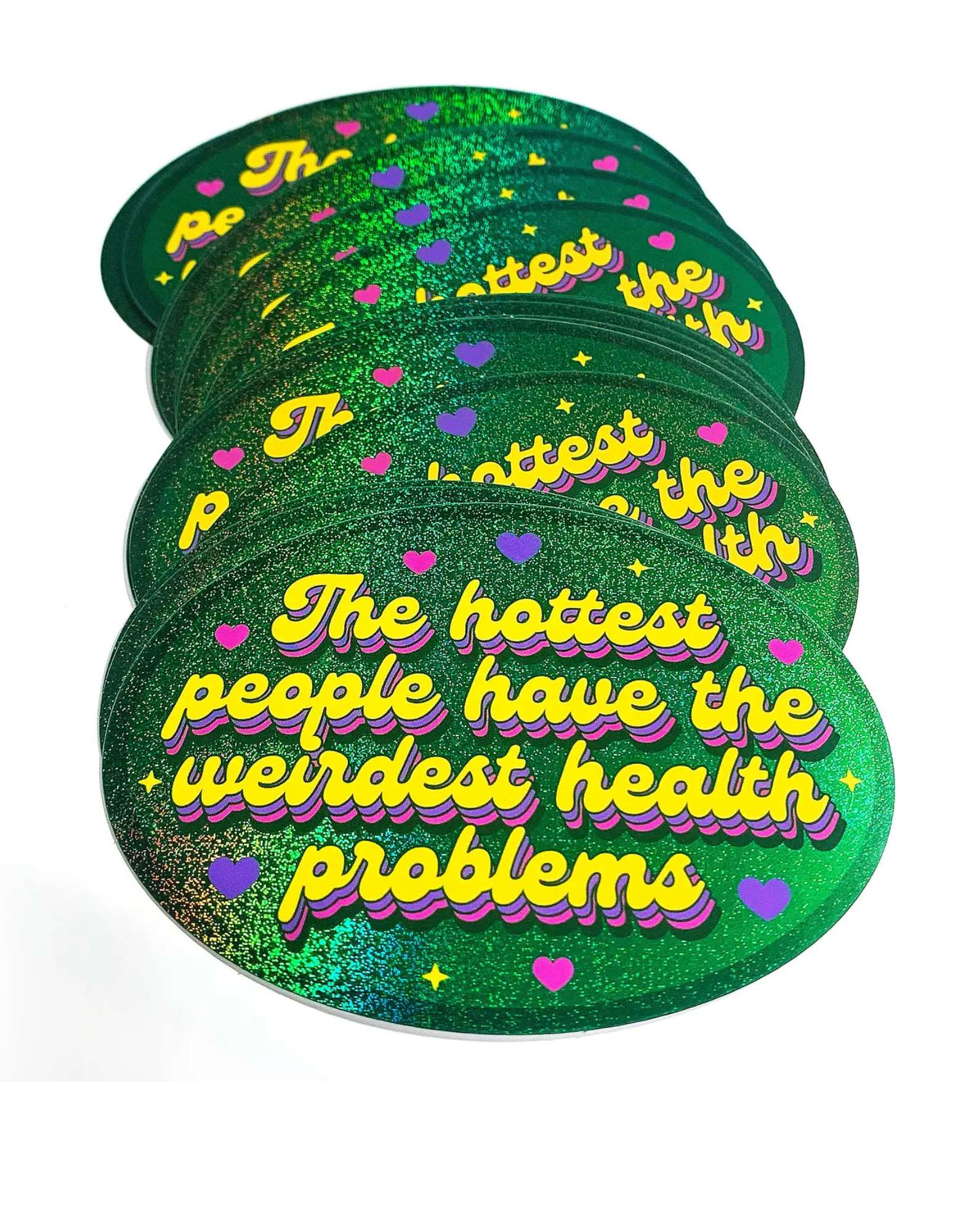 4.5×3.3 inch holographic glitter oval sticker reading ‘The hottest people have the weirdest health problems’