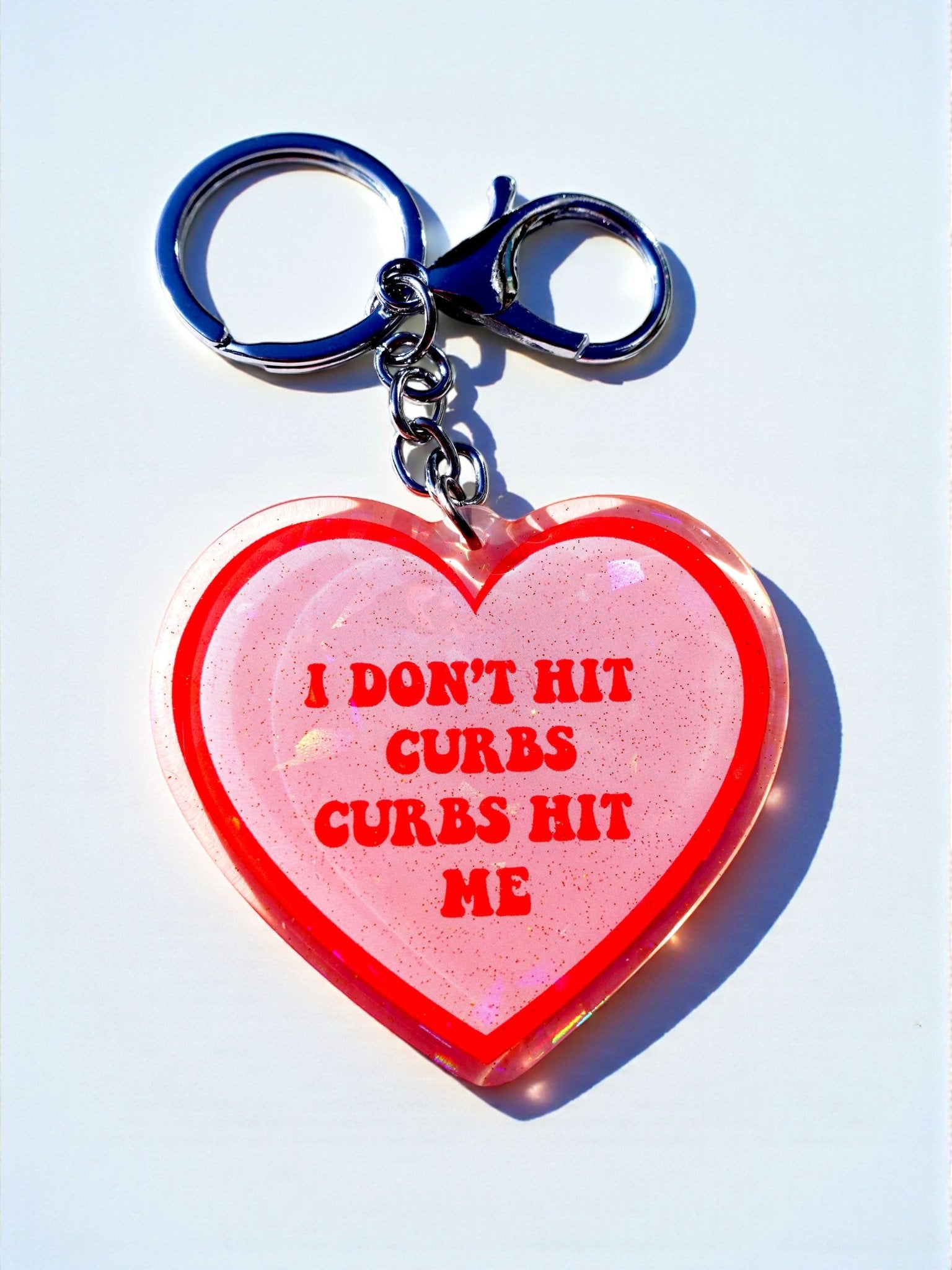 I Don't Hit Curbs Curbs Hit Me Holographic Heart Keychain - UntamedEgo LLC.