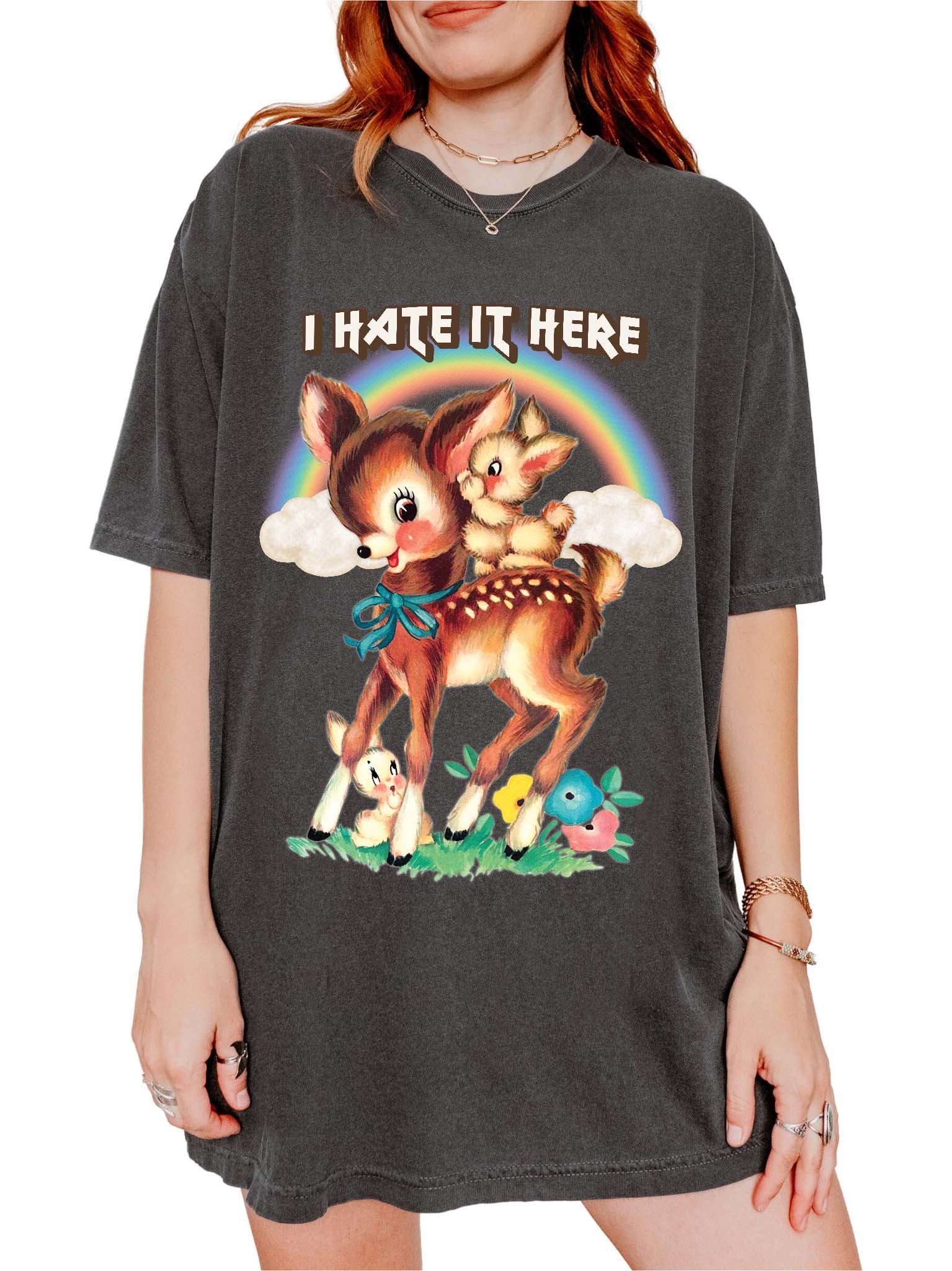 Funny graphic t-shirt with cute deer illustration and text saying I hate it here