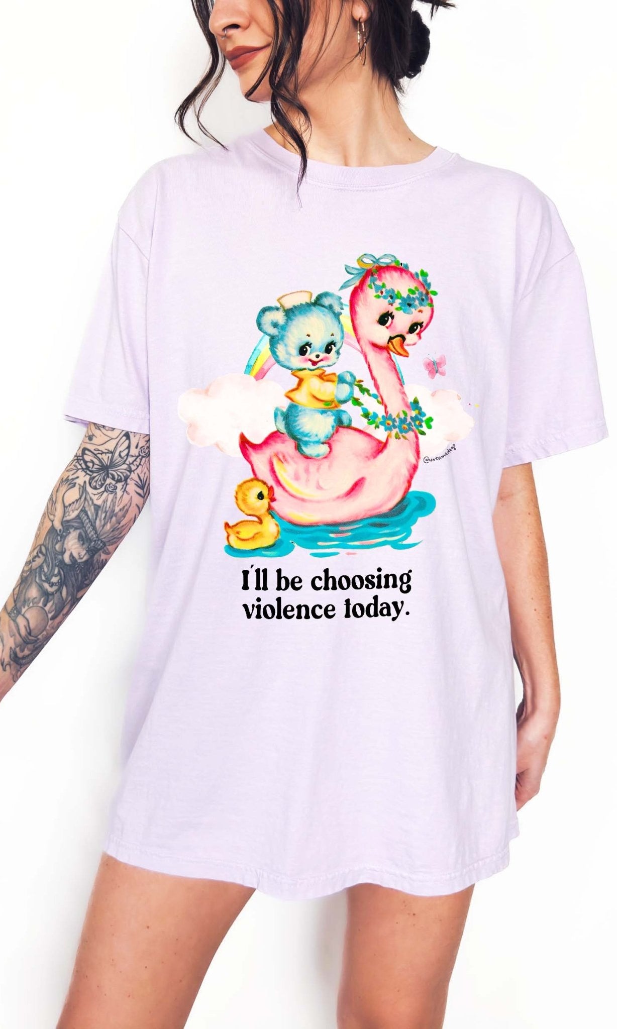 Funny graphic t-shirt with cute duck and swan illustration and text saying I’ll be choosing violence today