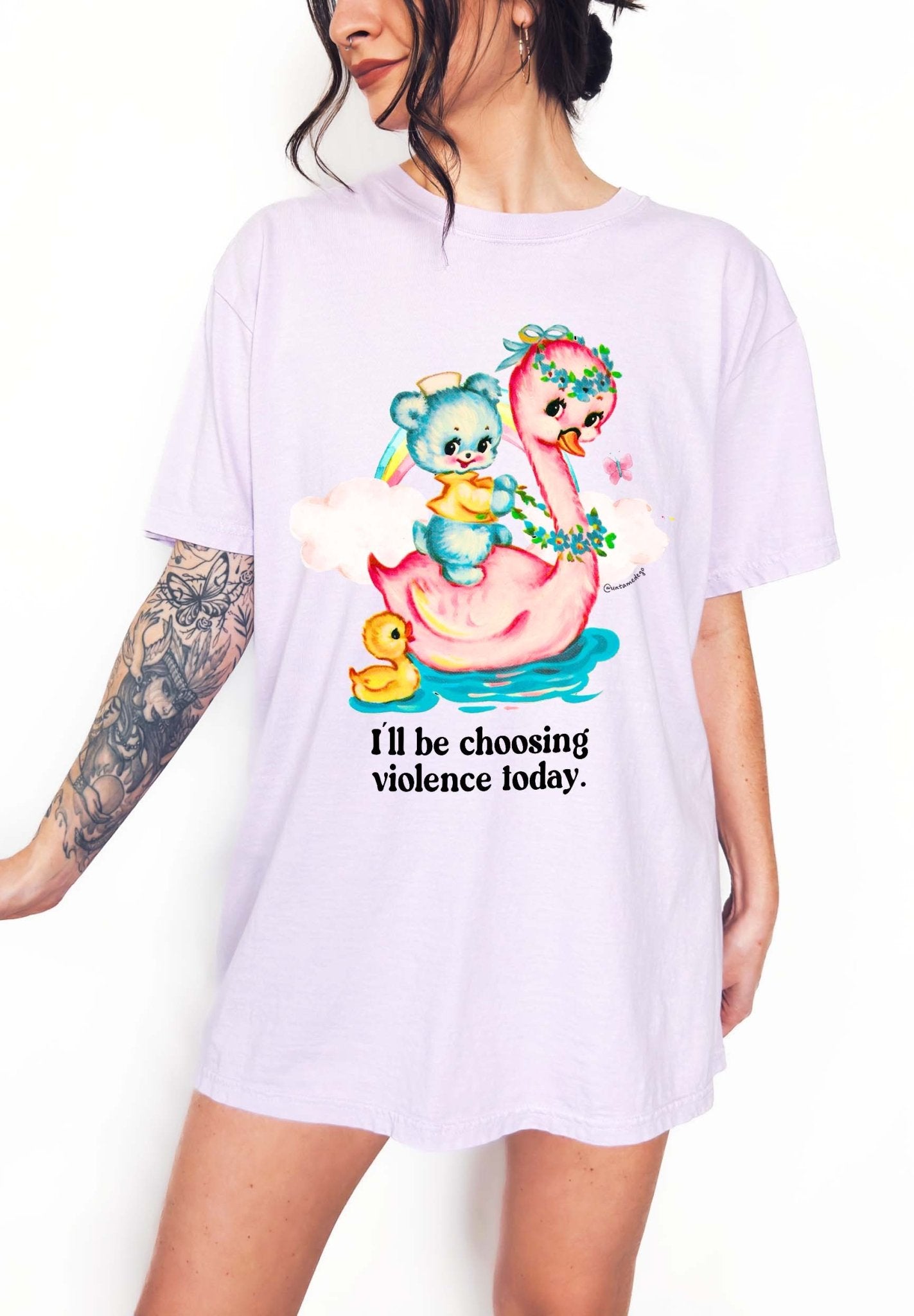 Funny graphic t-shirt with cute duck and swan illustration and text saying I’ll be choosing violence today