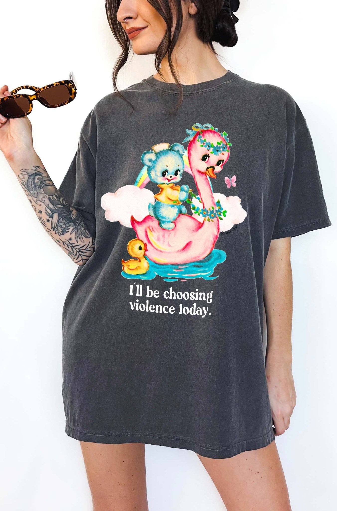 Funny graphic t-shirt with cute duck and swan illustration and text saying I’ll be choosing violence today