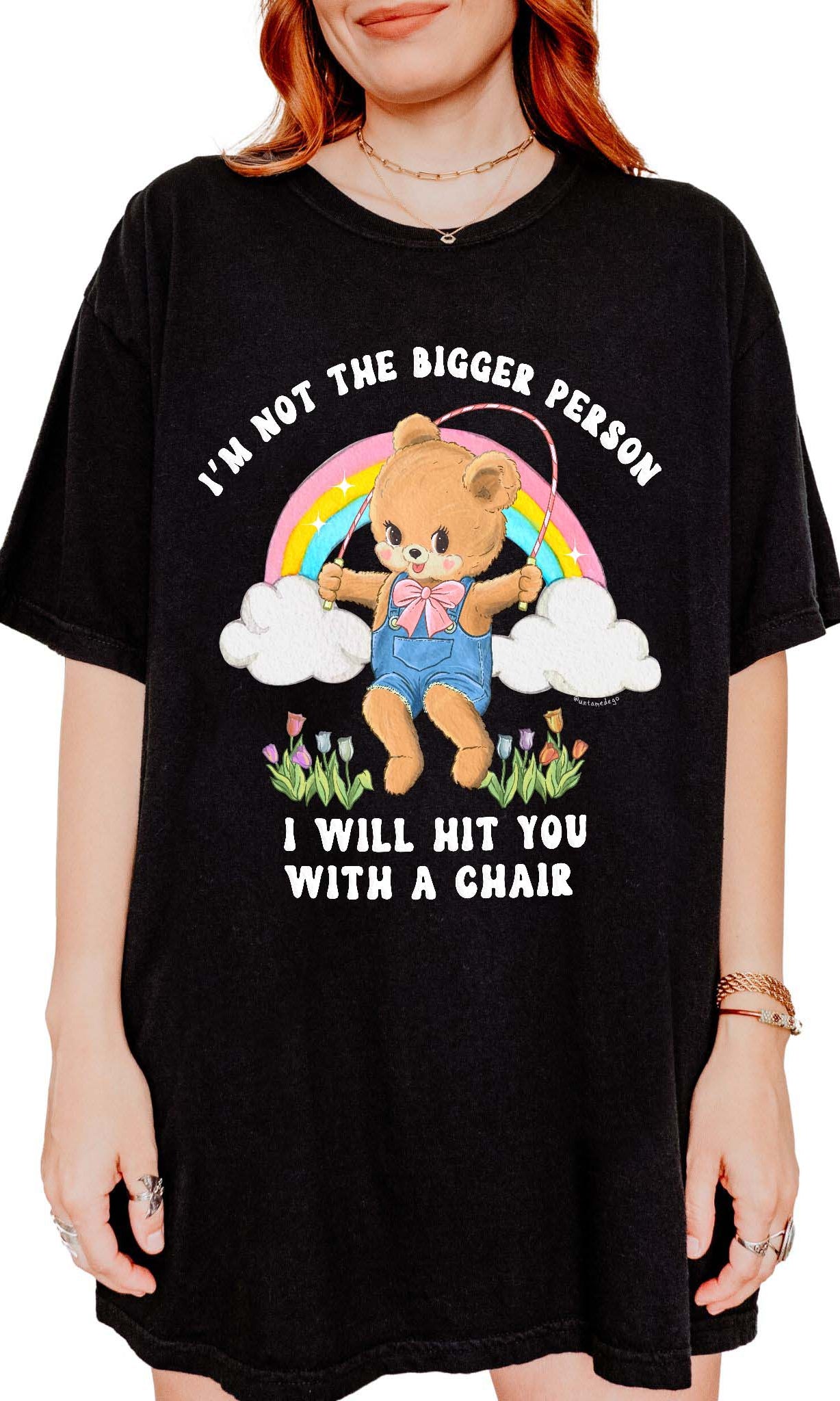 Funny graphic t-shirt with cute bear holding jump rope and bold text about not being the bigger person