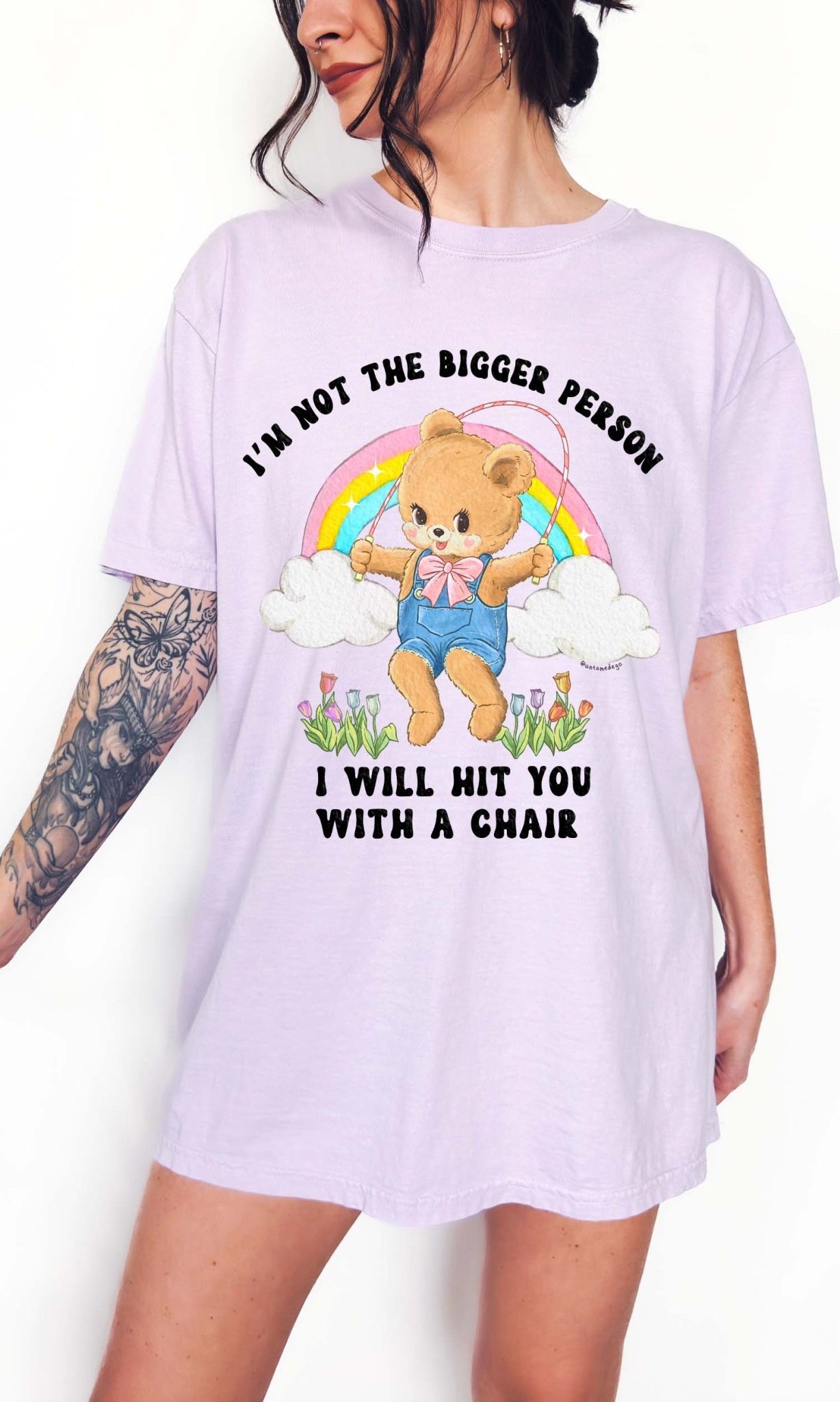 Funny graphic t-shirt with cute bear holding jump rope and bold text about not being the bigger person