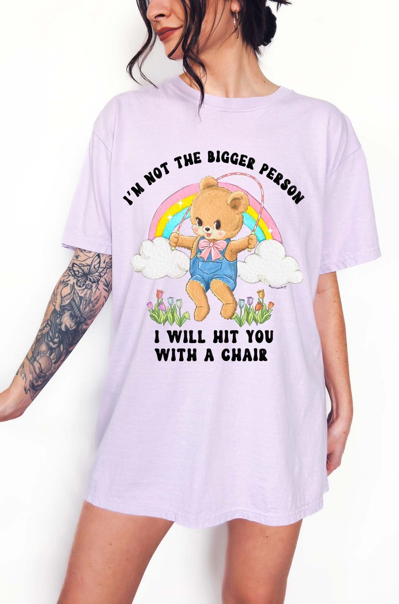 Funny graphic t-shirt with cute bear holding jump rope and bold text about not being the bigger person