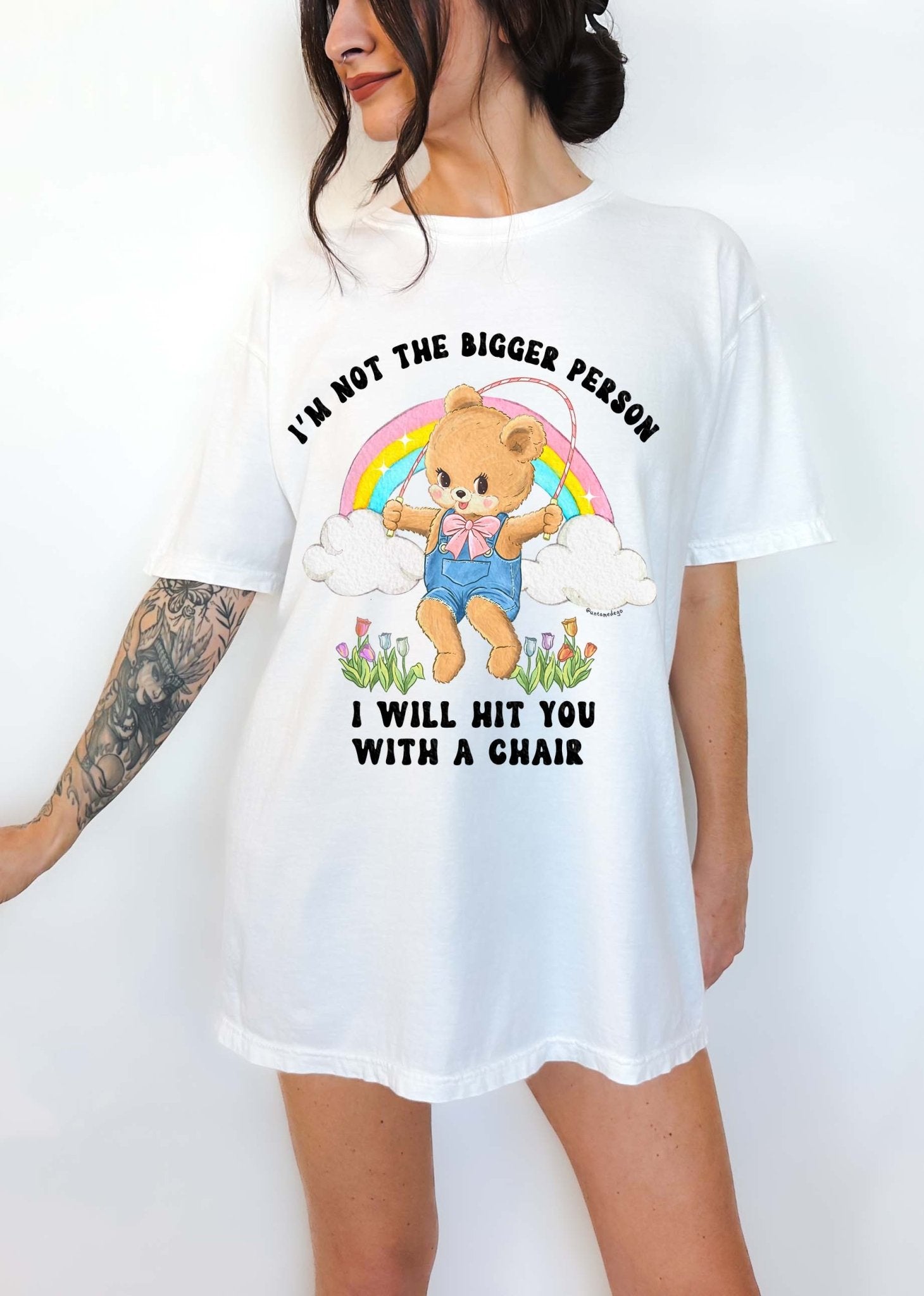 Funny graphic t-shirt with cute bear holding jump rope and bold text about not being the bigger person
