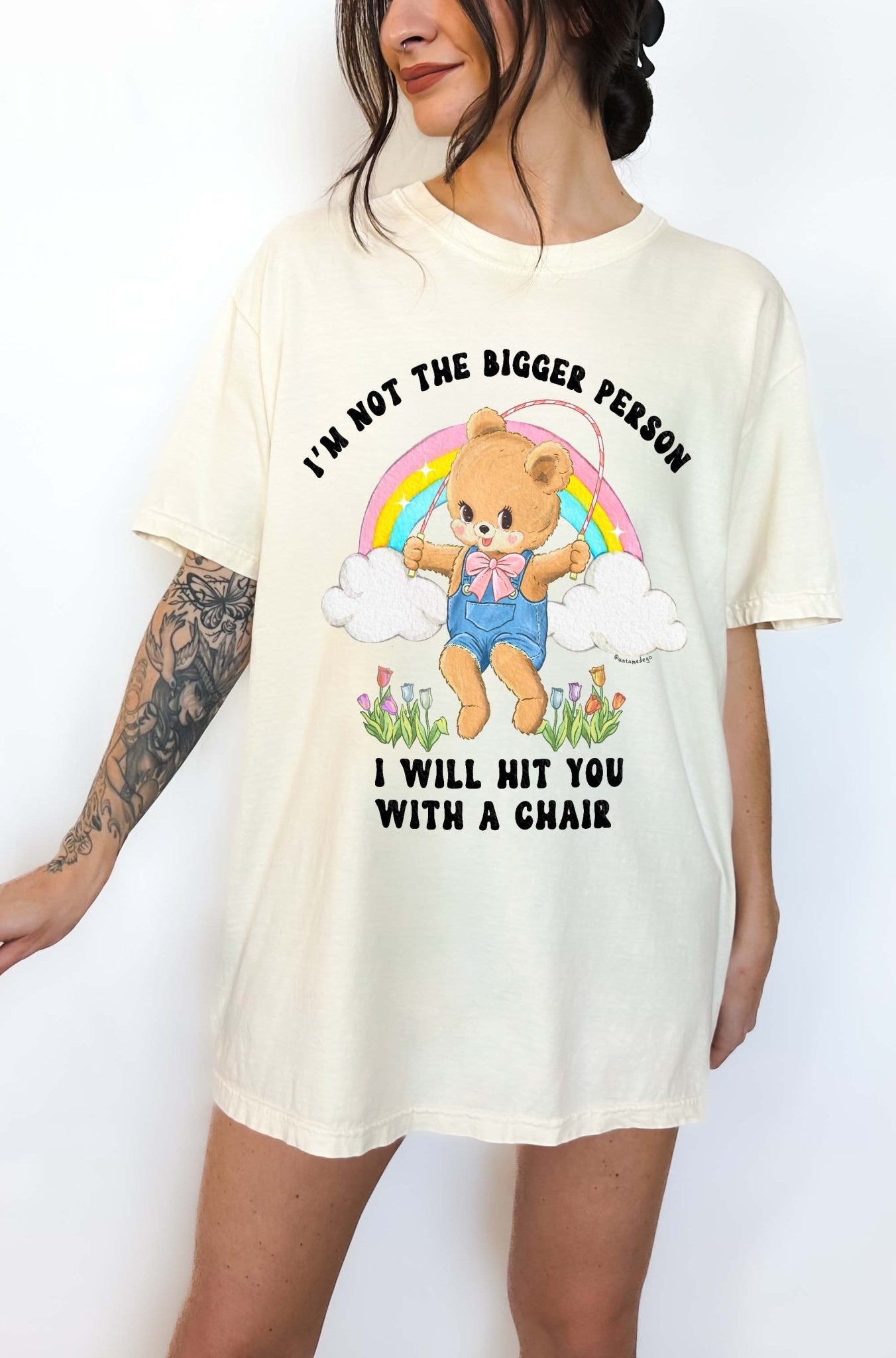 Funny graphic t-shirt with cute bear holding jump rope and bold text about not being the bigger person