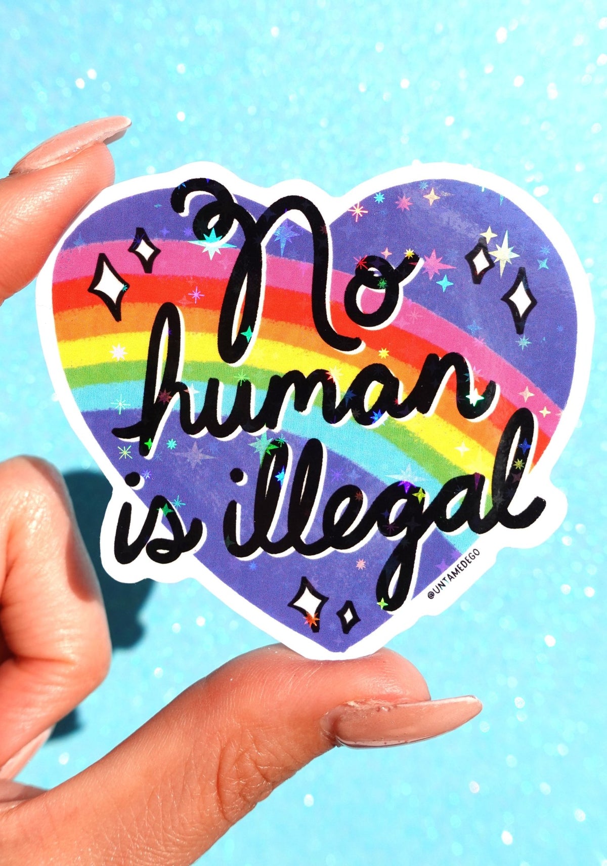No Human Is Illegal Sticker – Rainbow Heart Holographic Vinyl Sticker - UntamedEgo LLC.