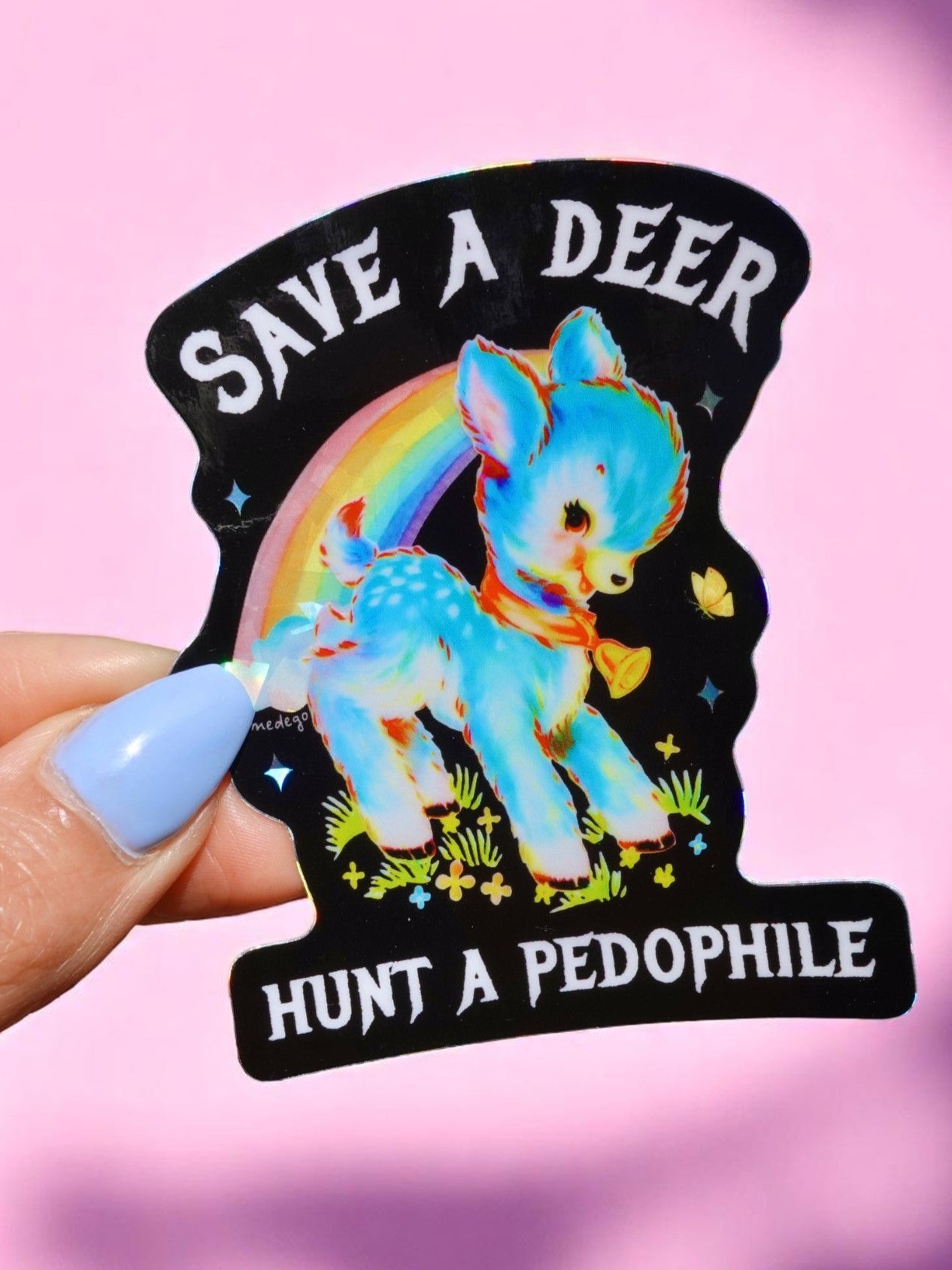 Funny waterproof vinyl sticker with pastel deer under a rainbow. Text says “Save a Deer, Hunt a Pedophile.” Glossy finish and dark humor theme.