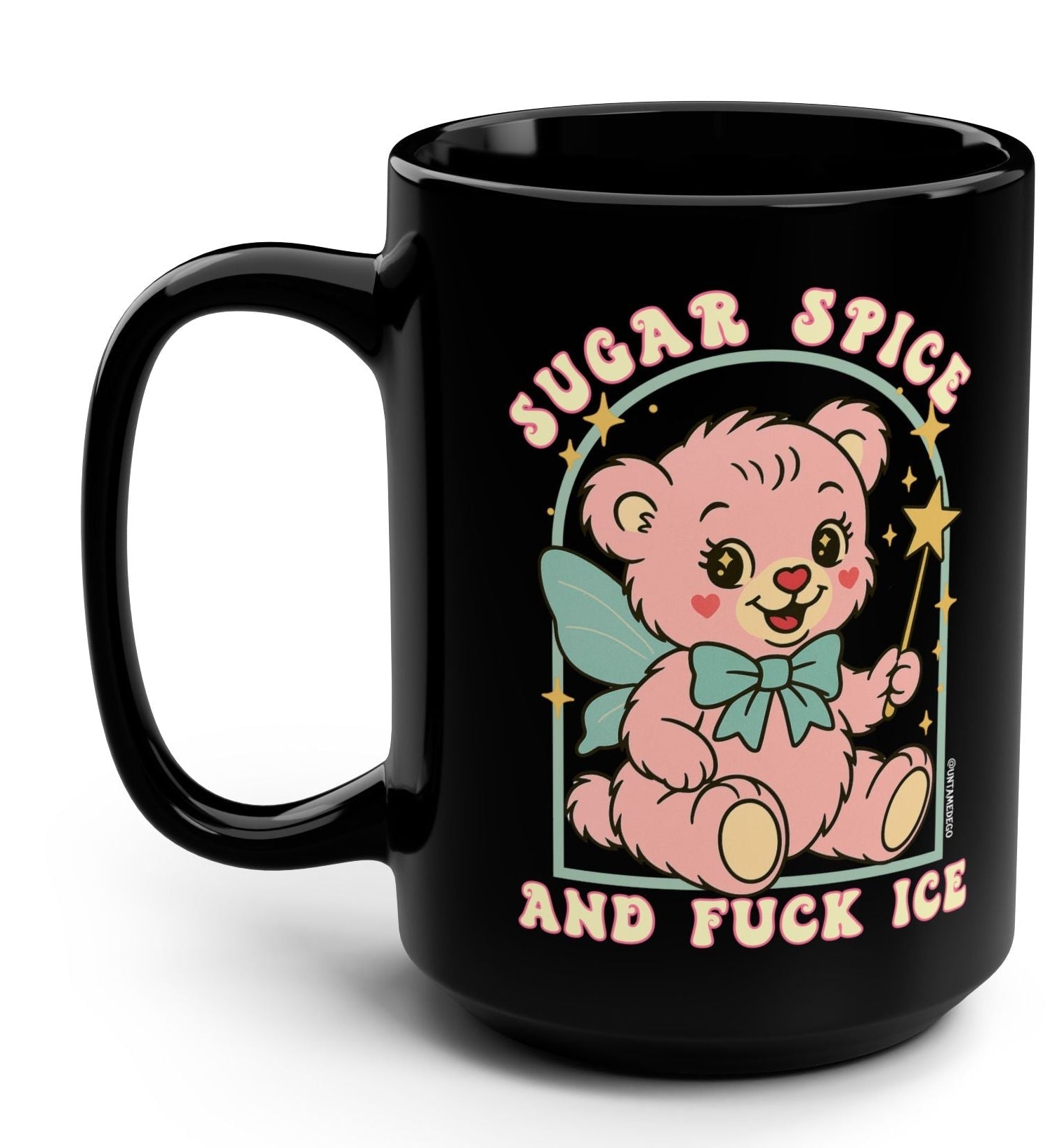 Black mug with a pink teddy bear graphic and text on a white background