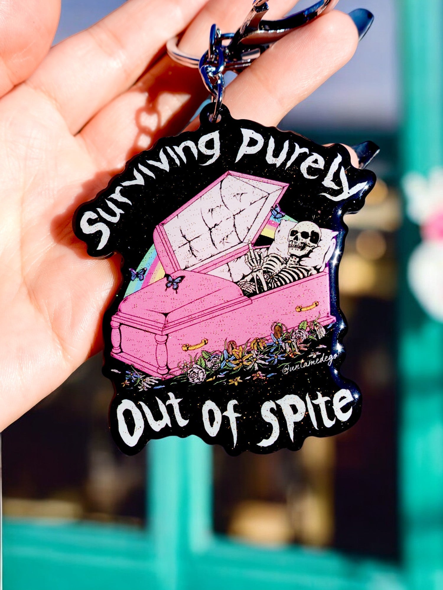 Surviving Purely Out Of Spite Keychain - UntamedEgo LLC.
