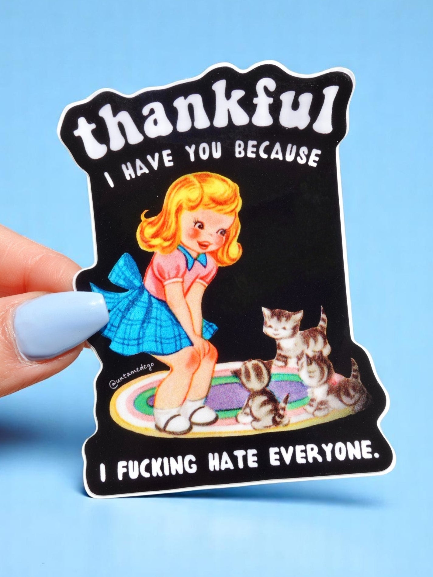 Funny vinyl sticker with retro-style girl and kittens on a rug. Text reads “Thankful I Have You Because I F*cking Hate Everyone.”