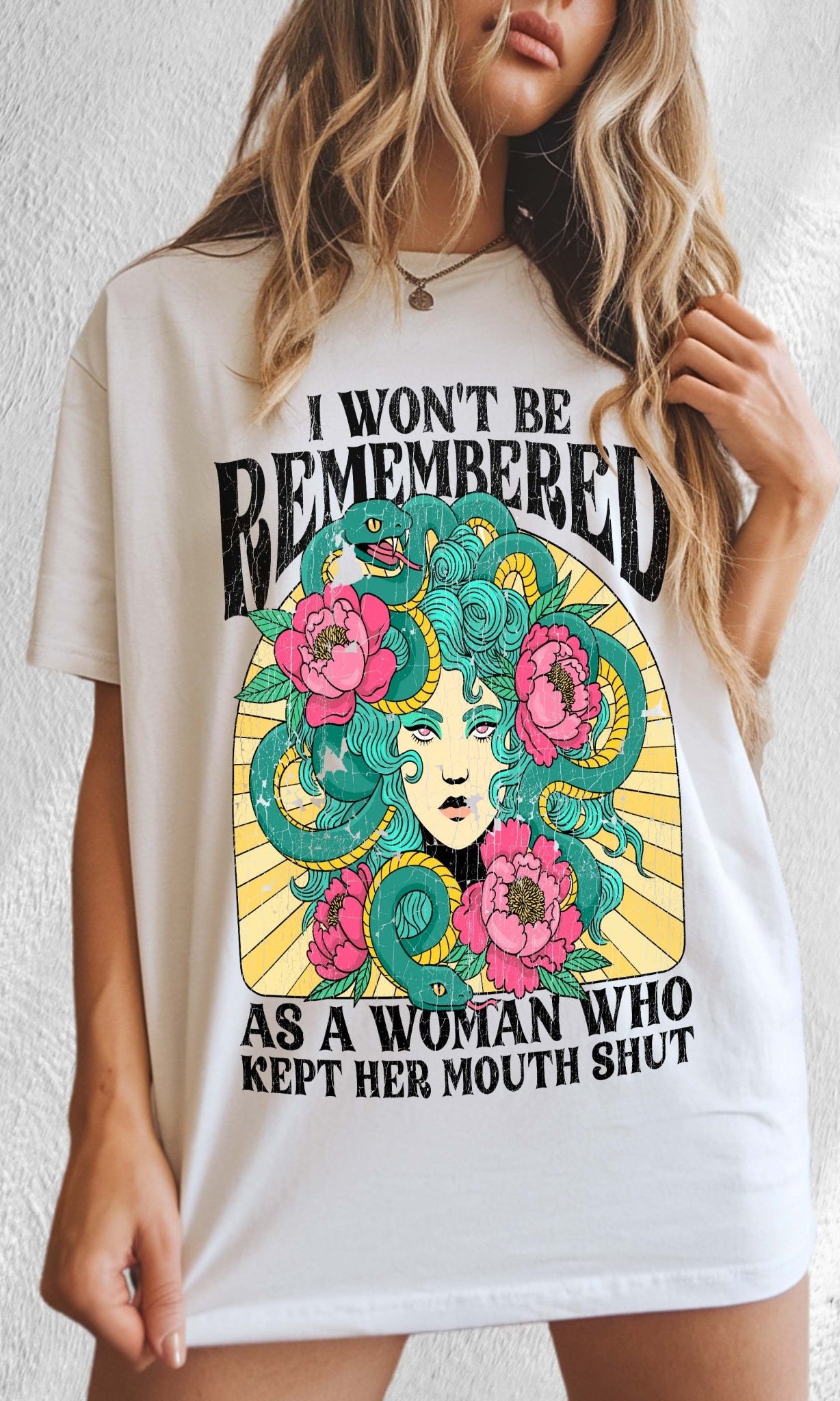 Women empowerment graphic t-shirt with Medusa design and bold feminist statement text