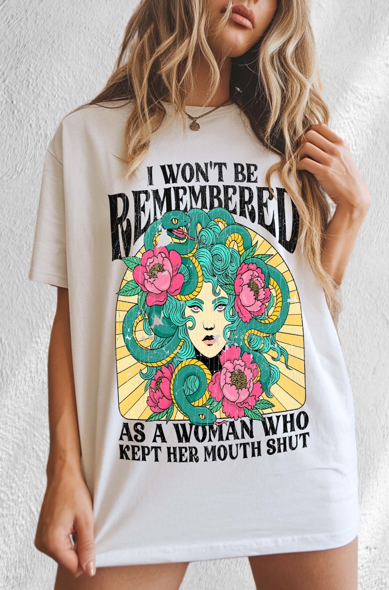 Women empowerment graphic t-shirt with Medusa design and bold feminist statement text