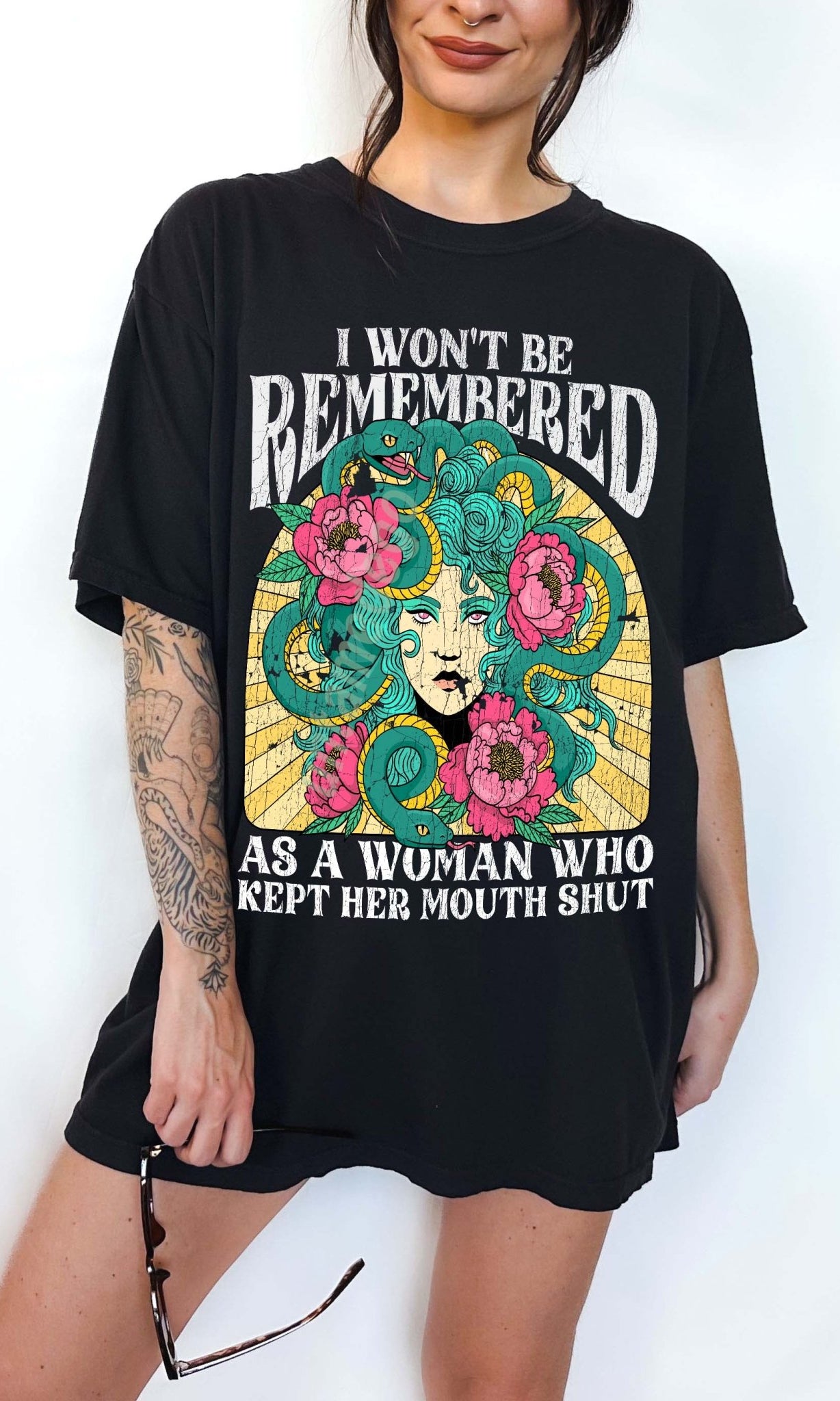 Women empowerment graphic t-shirt with Medusa design and bold feminist statement text
