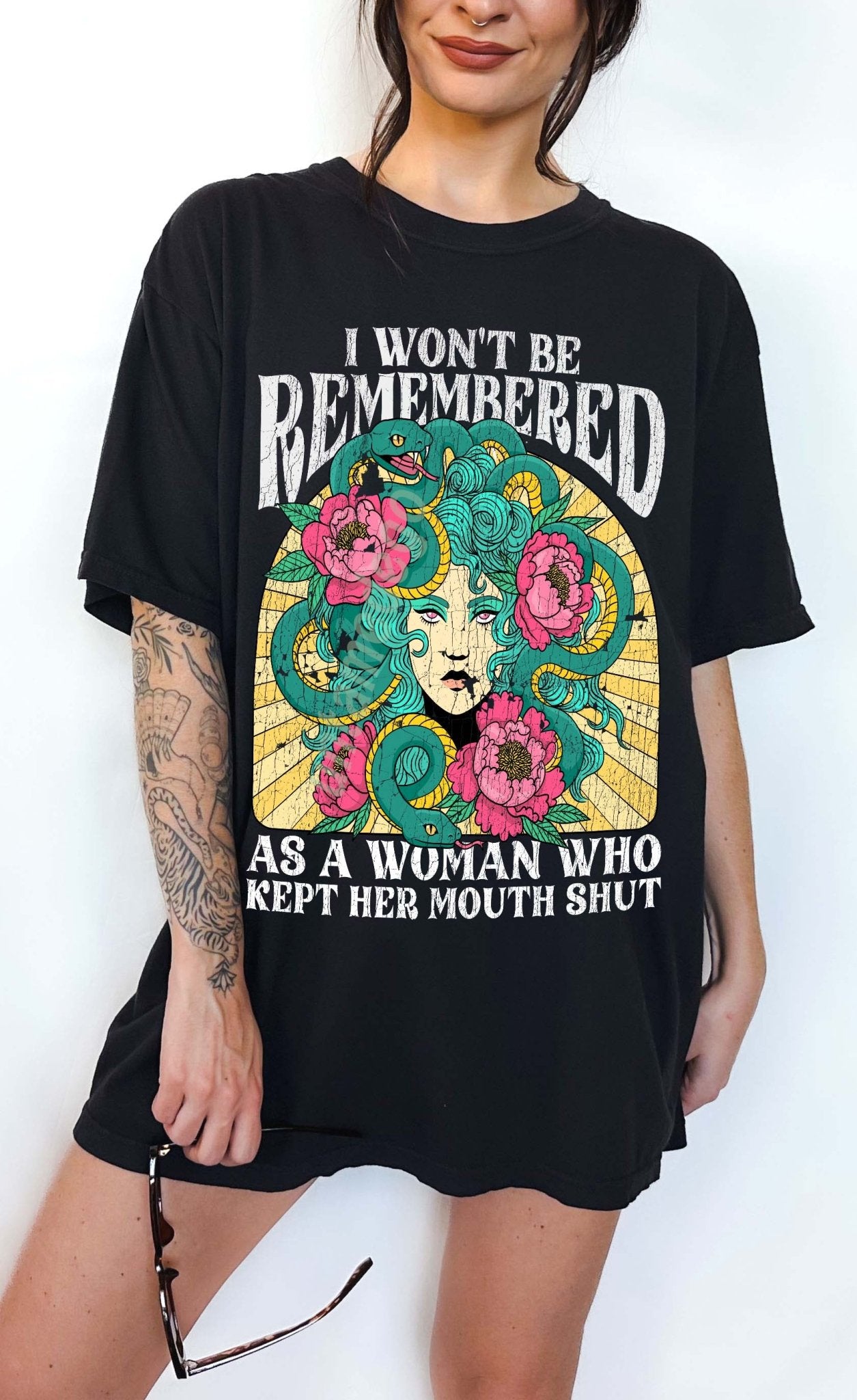 Women empowerment graphic t-shirt with Medusa design and bold feminist statement text
