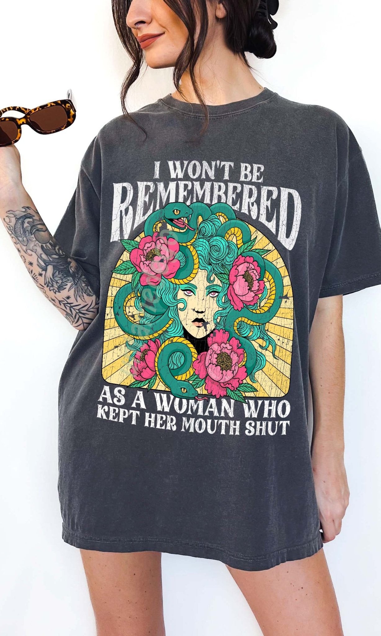 Women empowerment graphic t-shirt with Medusa design and bold feminist statement text