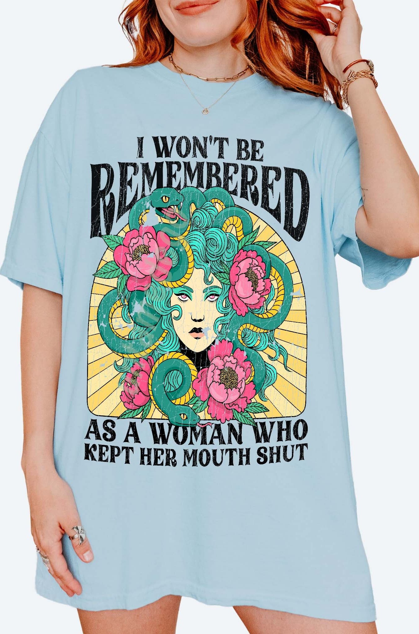 Women empowerment graphic t-shirt with Medusa design and bold feminist statement text