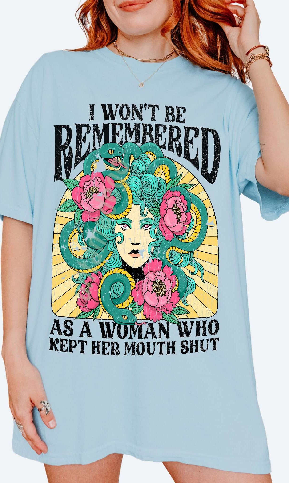 Women empowerment graphic t-shirt with Medusa design and bold feminist statement text