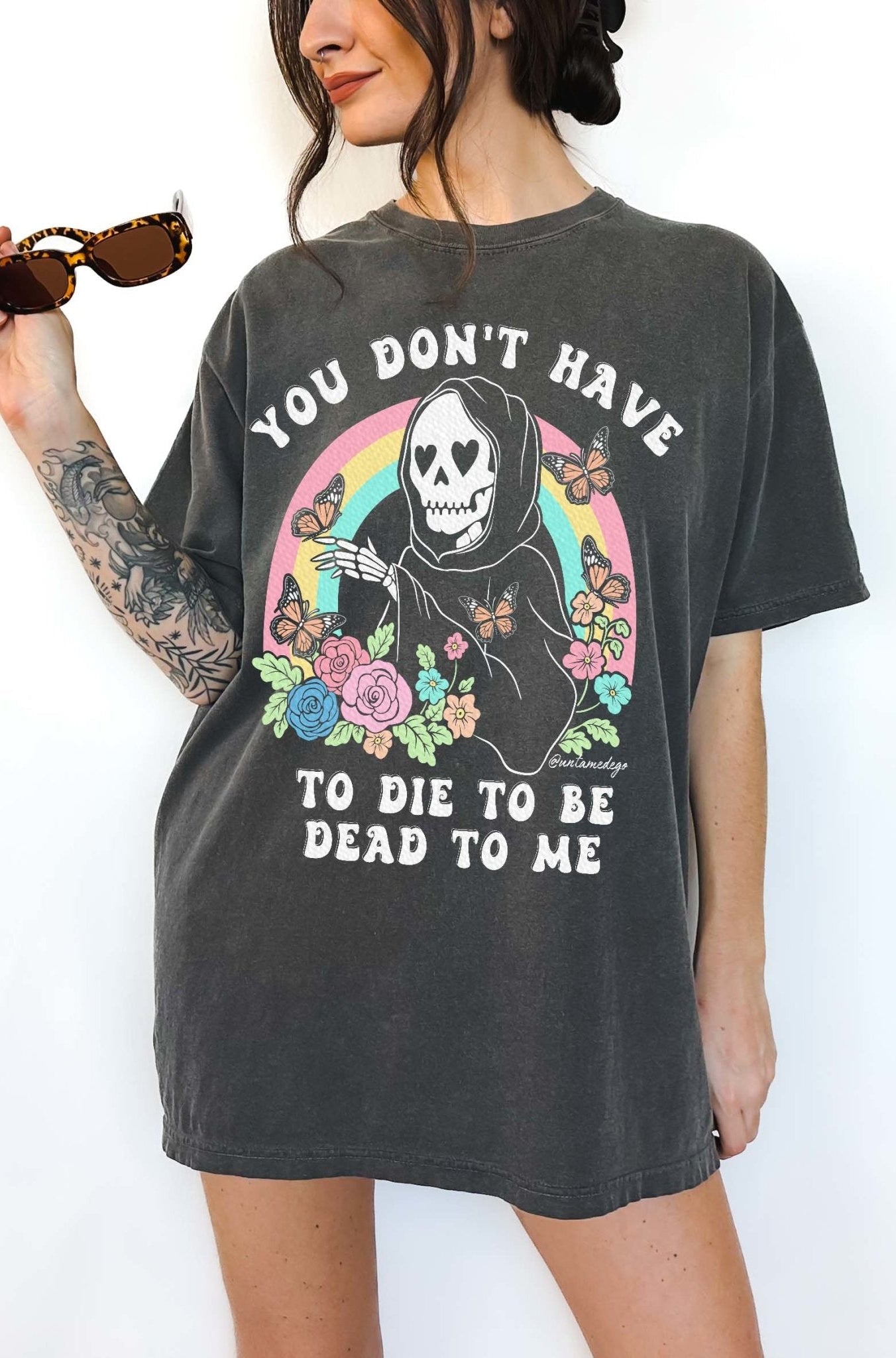 Funny dark humor t-shirt with skeleton graphic and text saying you don’t have to die to be dead to me