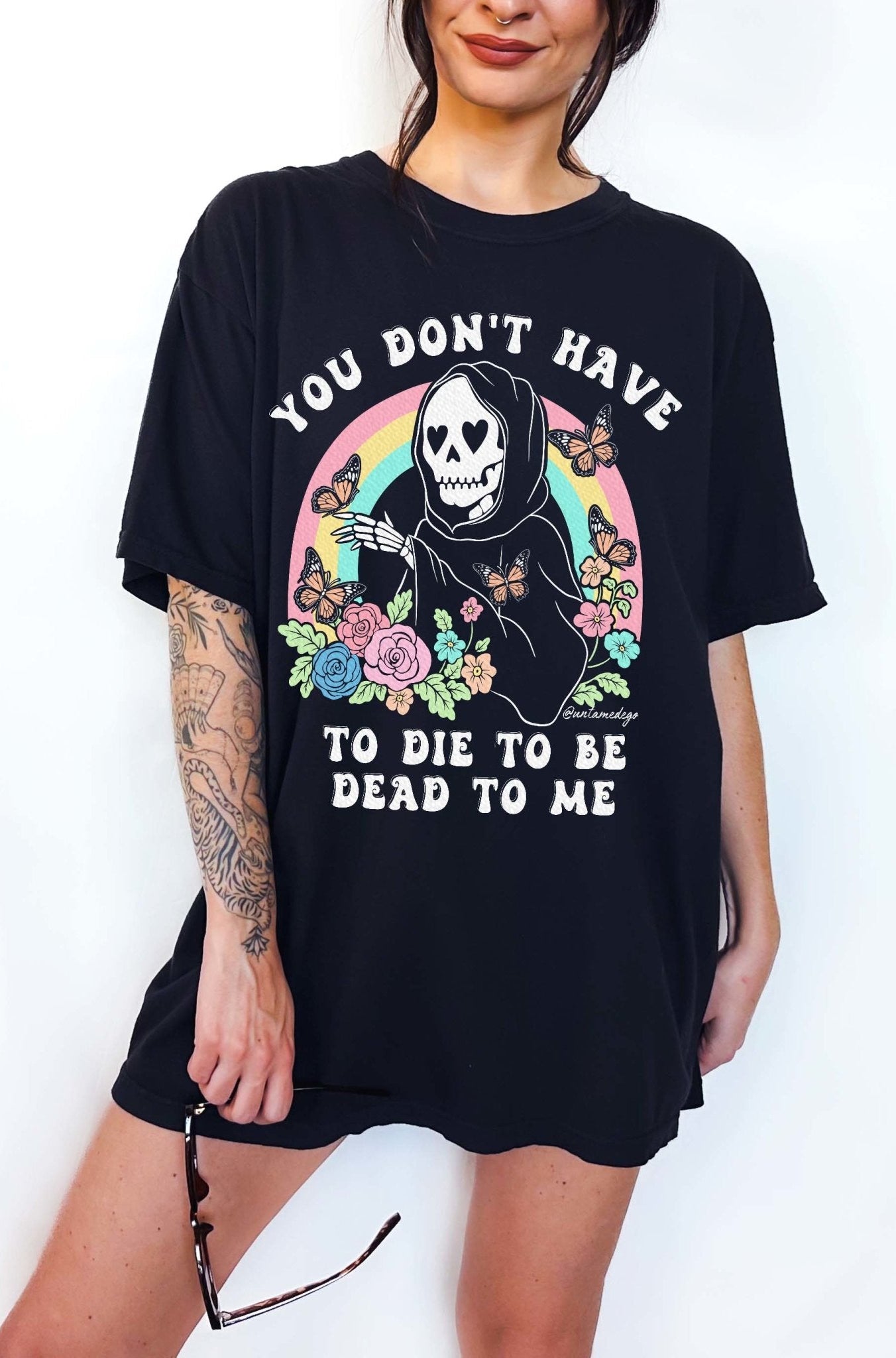 Funny dark humor t-shirt with skeleton graphic and text saying you don’t have to die to be dead to me
