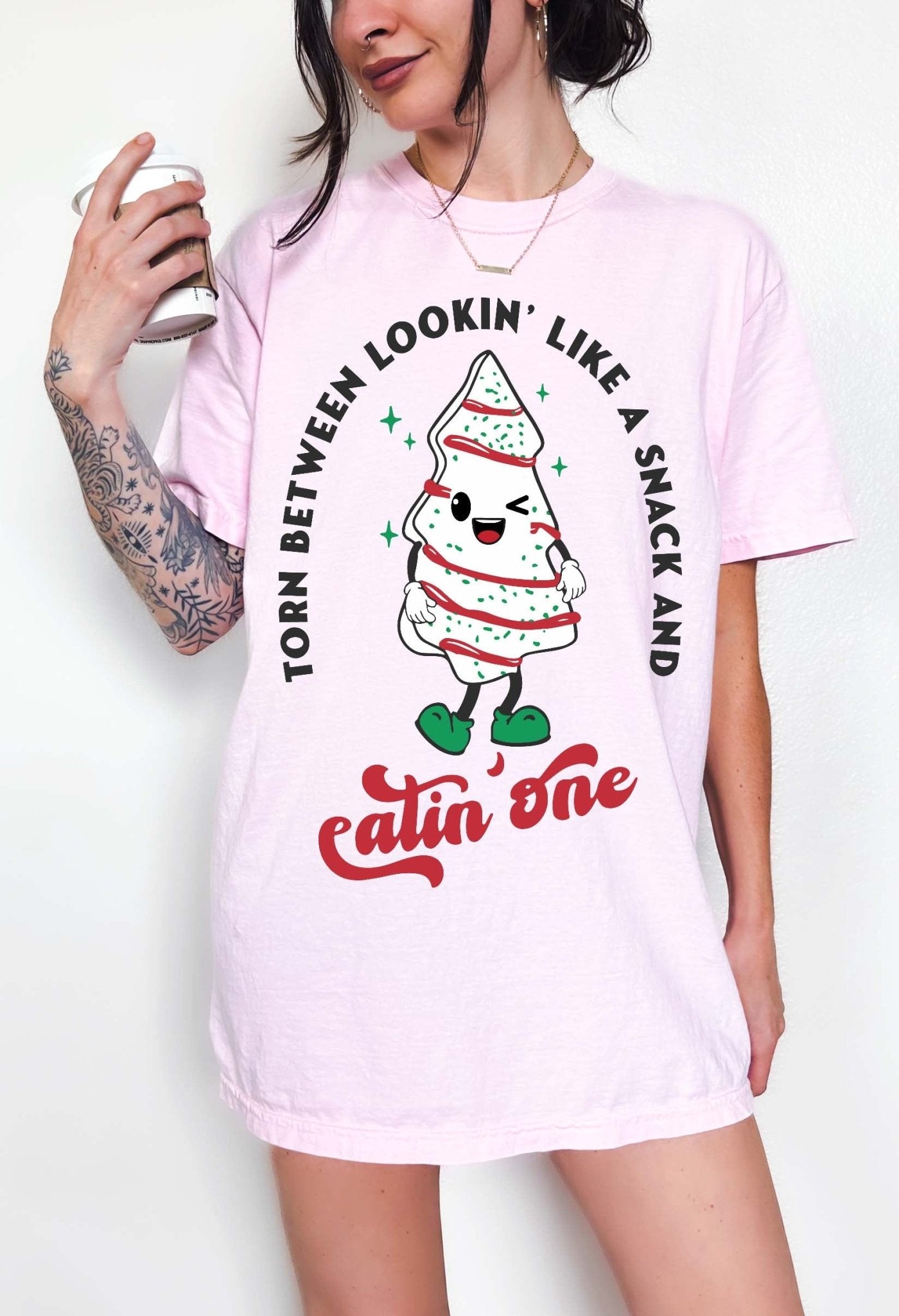 Torn Between Lookin Like A Snack And Eatin One Christmas Tee - UntamedEgo LLC.