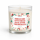 A clear glass jar candle with white wax and a humorous holiday-themed label that reads 'SMELLS LIKE LET'S CIRCLE BACK AFTER THE HOLIDAYS' in red text, surrounded by red and green holiday illustrations. The brand name 'UNTAMEDGO' is visible at the top of the label.