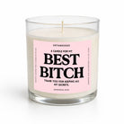 A clear glass jar candle with white wax and a pink label featuring bold black text that reads 'BEST BITCH' with smaller text above and below, photographed on a clean white background.